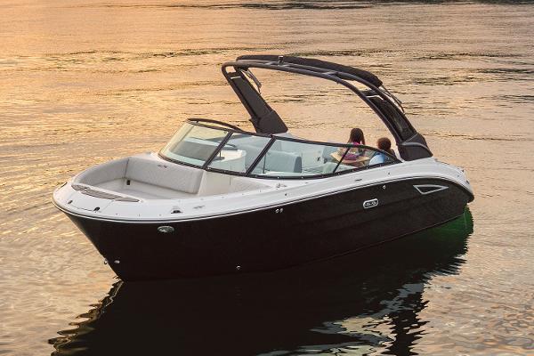Manufacturer Provided Image: 2025 Sea Ray SDX 250 boat on calm water at sunset.