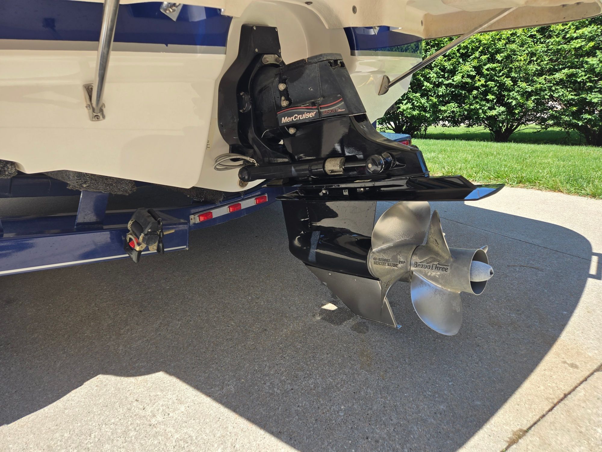 The image shows the drive of a 2005 Chaparral 220 SSi boat on a trailer.