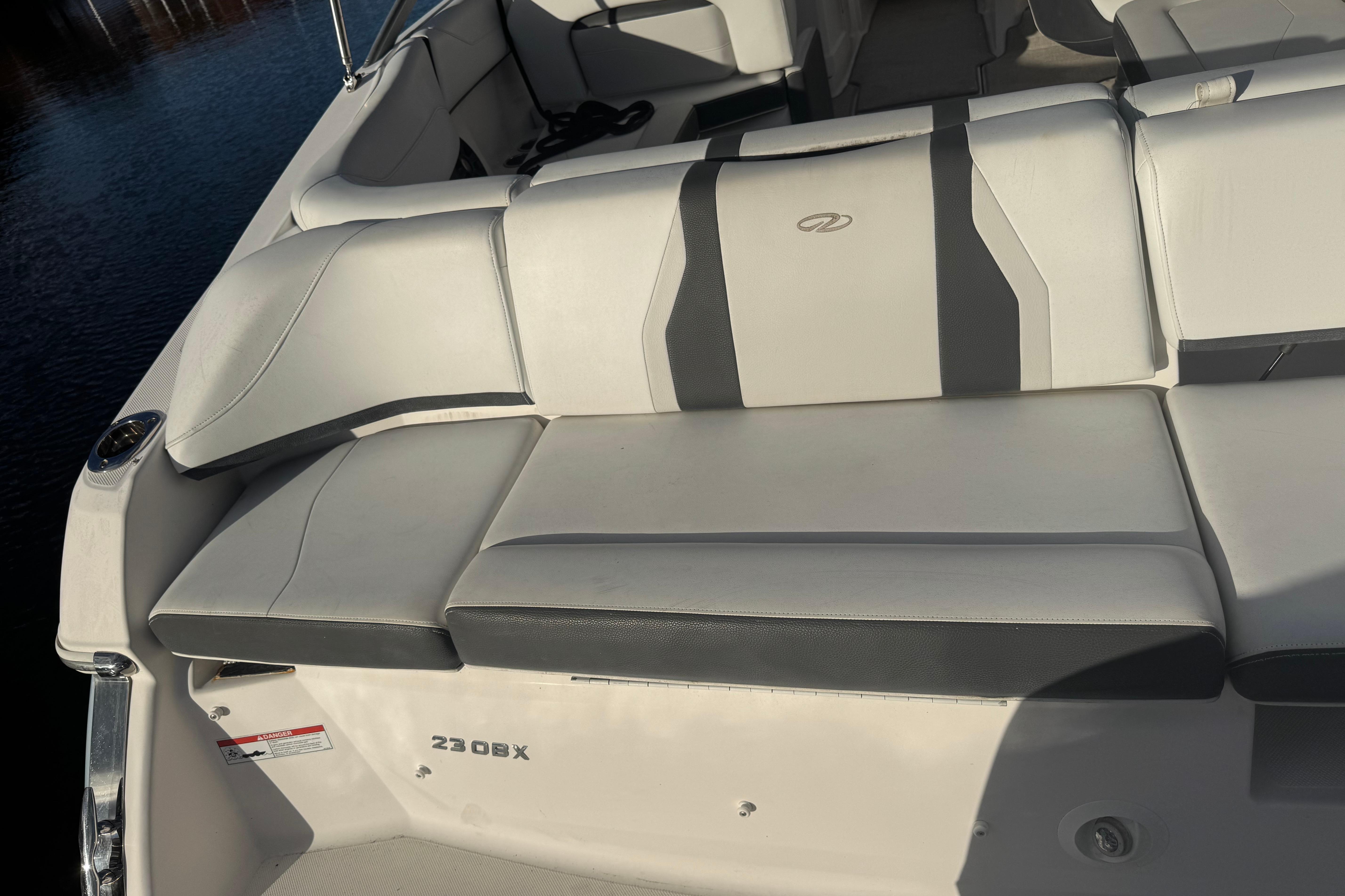 2017 Regal 23 OBX boat interior with white and gray seating.