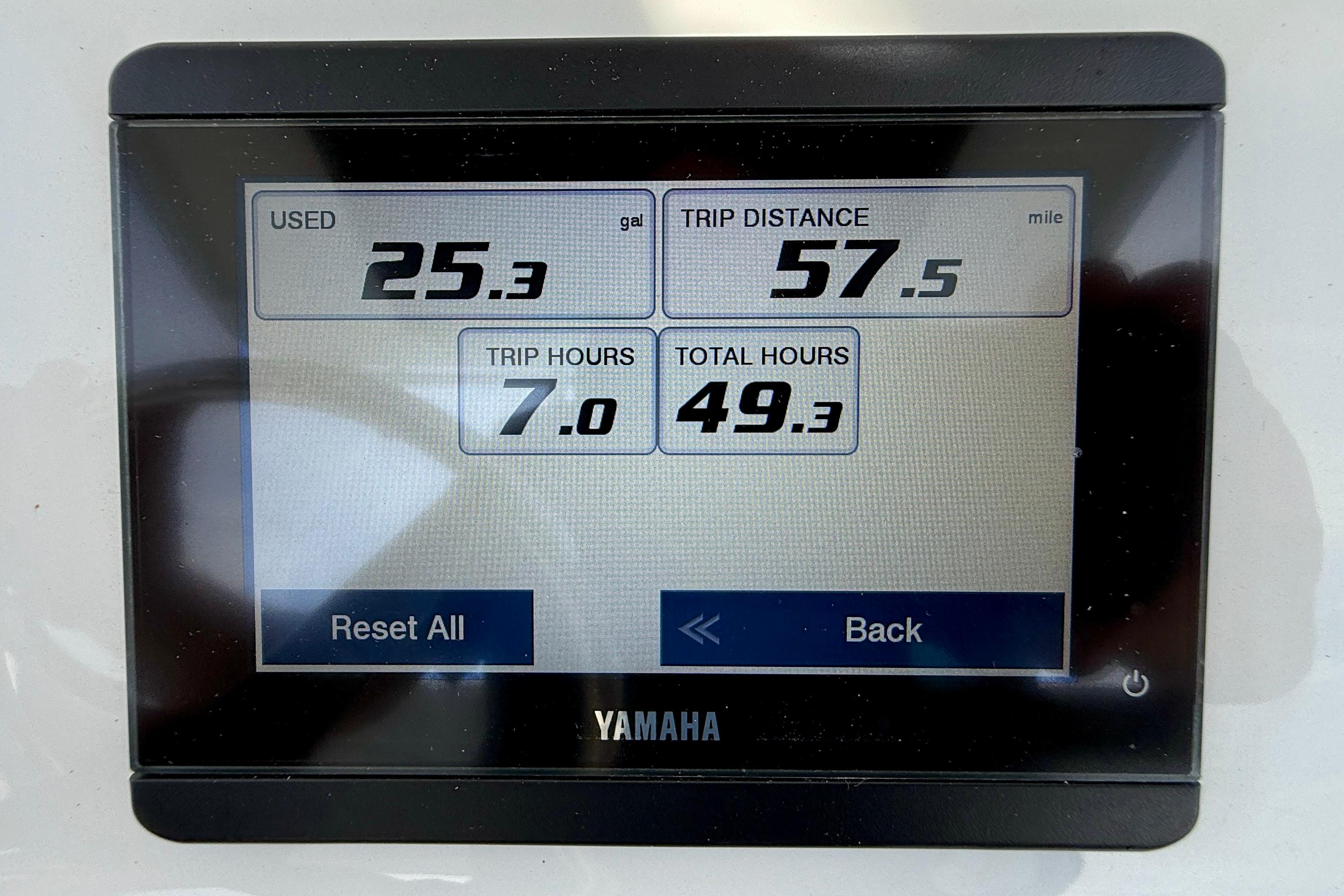 Yamaha display showing fuel usage, trip distance, and hours for 2023 Edgewater 245CC boat.