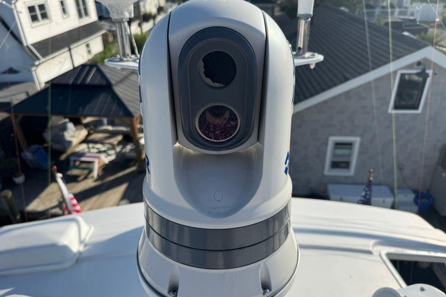 Close-up of a camera on a 2002 Viking 61 Enclosed Bridge yacht.