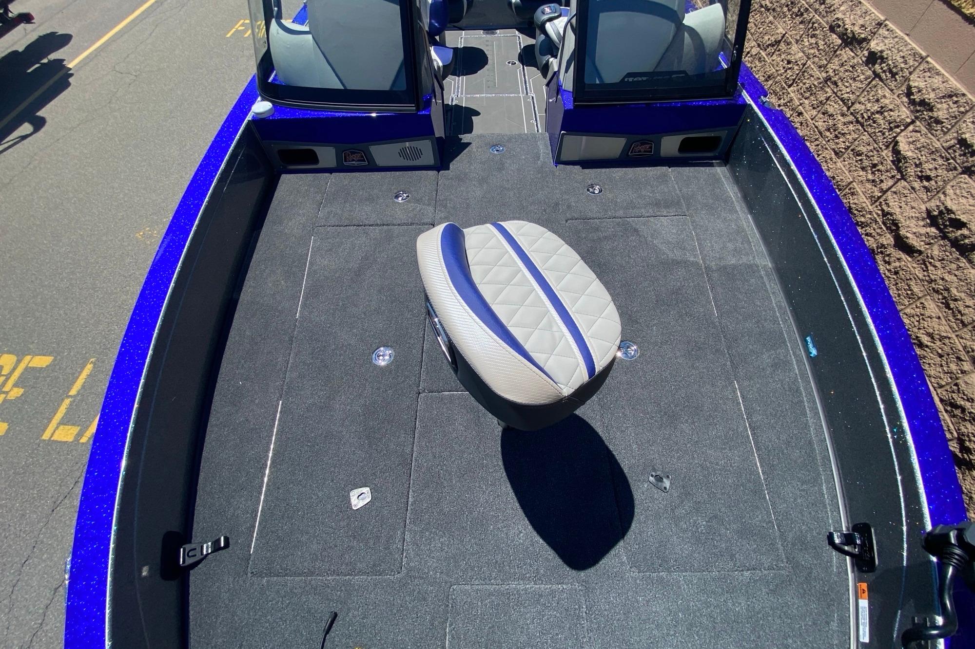 2026 Ranger 622FS Pro boat interior with blue accents and cushioned seating.