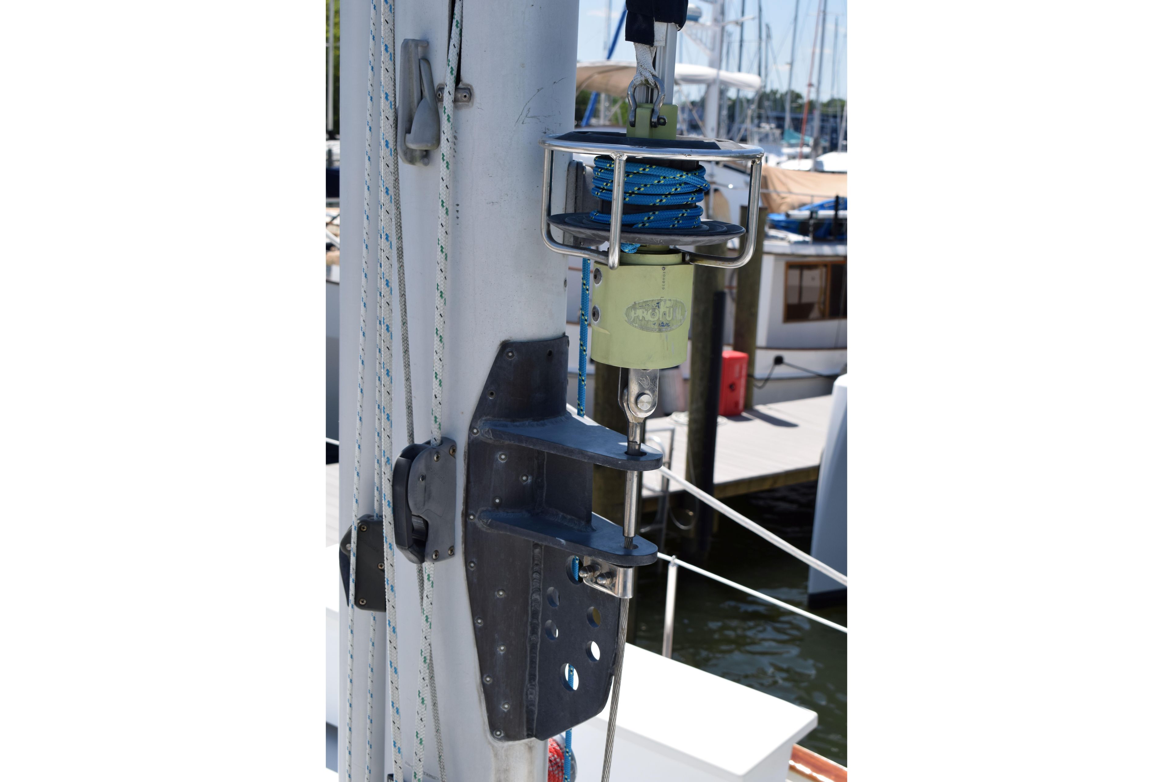 Close-up of a 1980 Cheoy Lee 52 Motorsailer mast with rigging details.