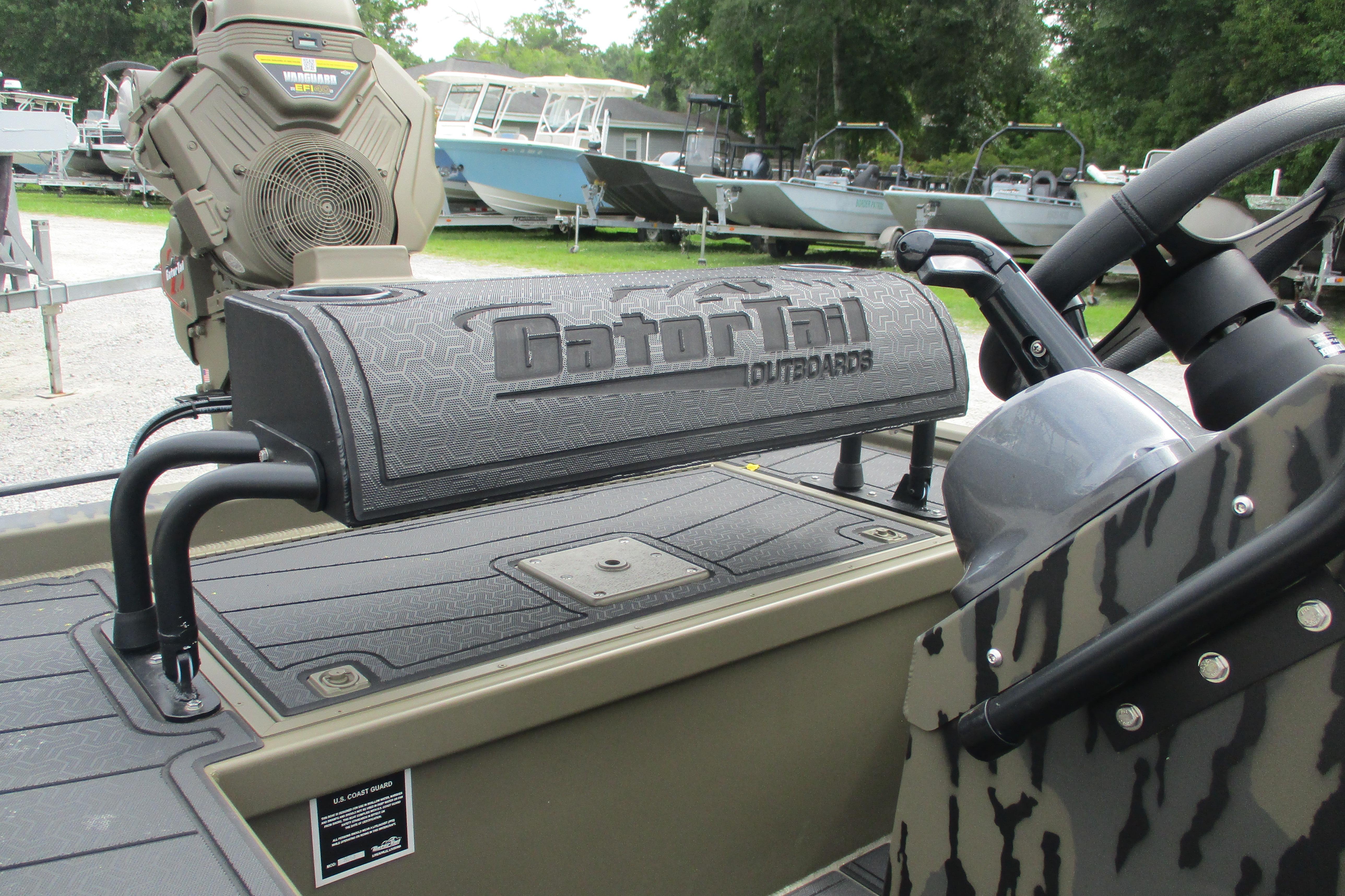 2026 Gator Tail 2060 Extreme CC boat with camo design and outboard motor.
