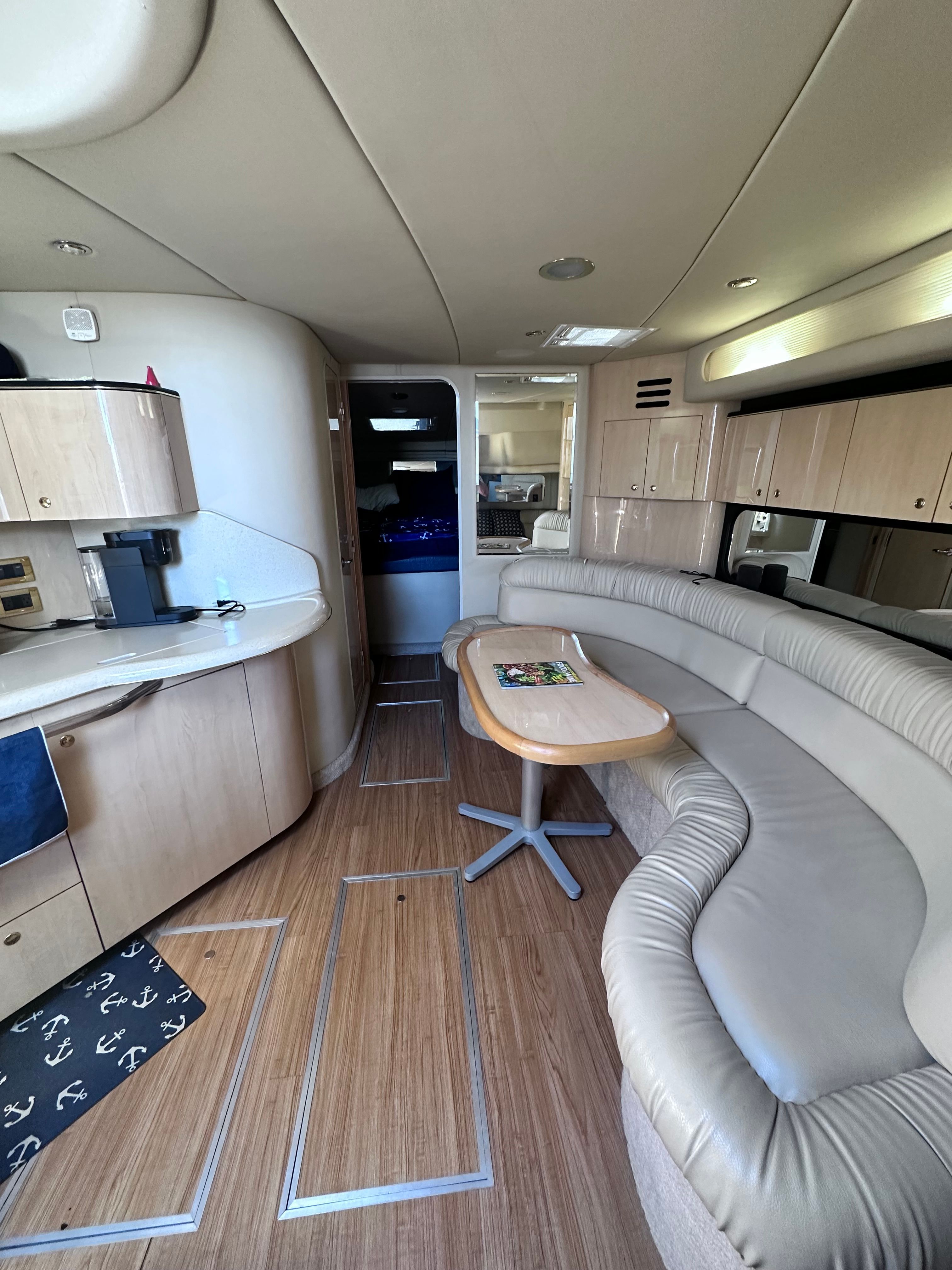 Luxurious interior of 2000 Sea Ray 380 Sundancer yacht with modern amenities.