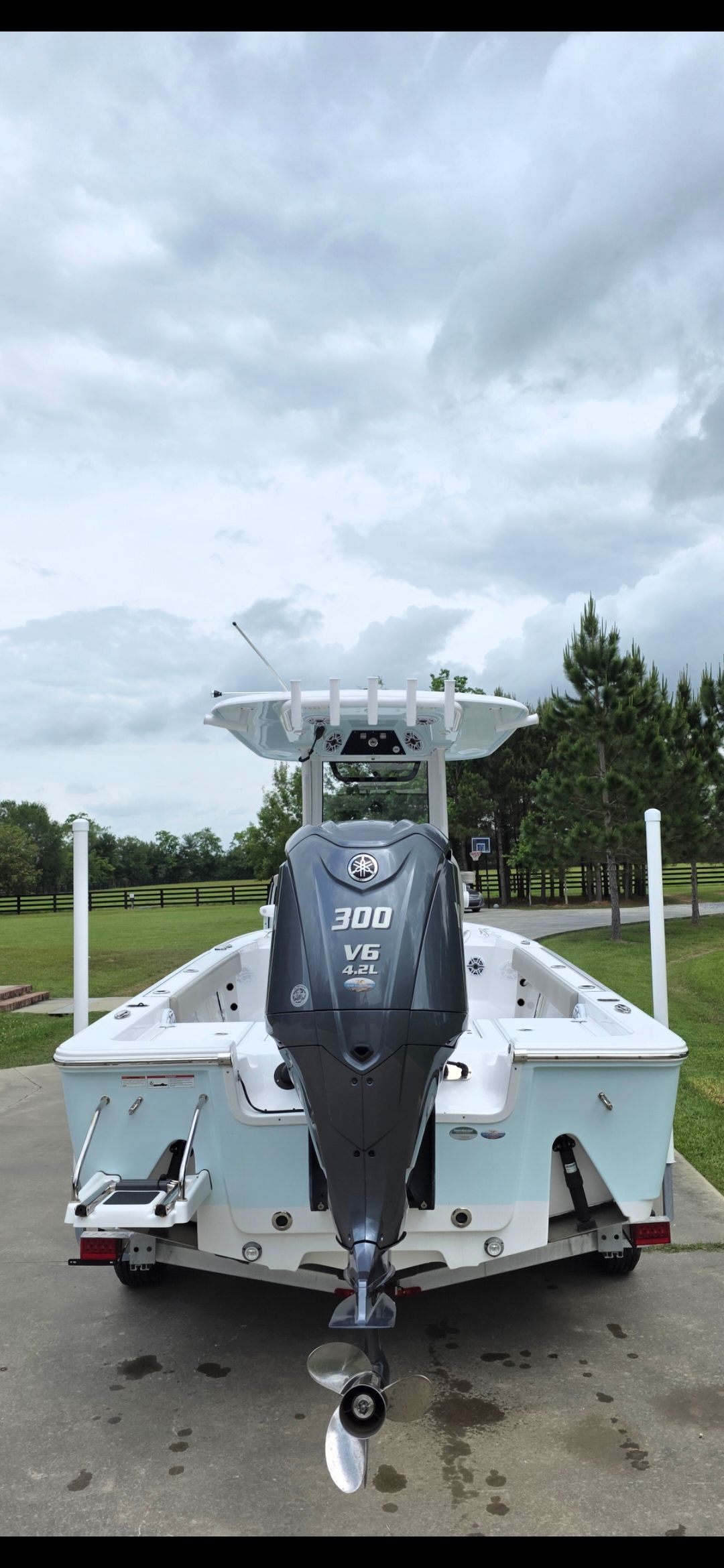 2023 Sportsman Masters 247 Bay Boat with 300 HP outboard motor.