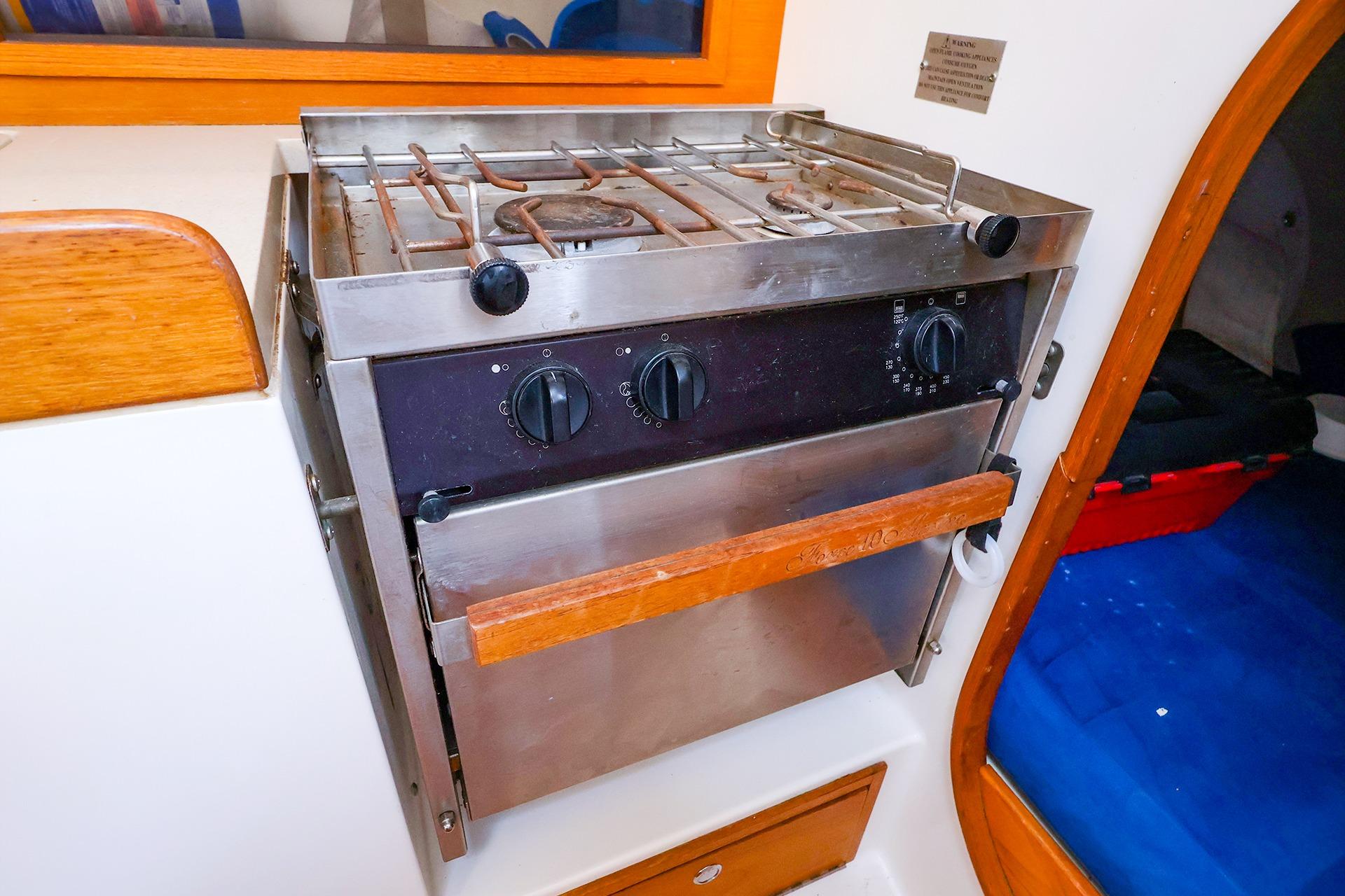 Stainless steel stove and oven in 2001 J Boats J/32 yacht galley.