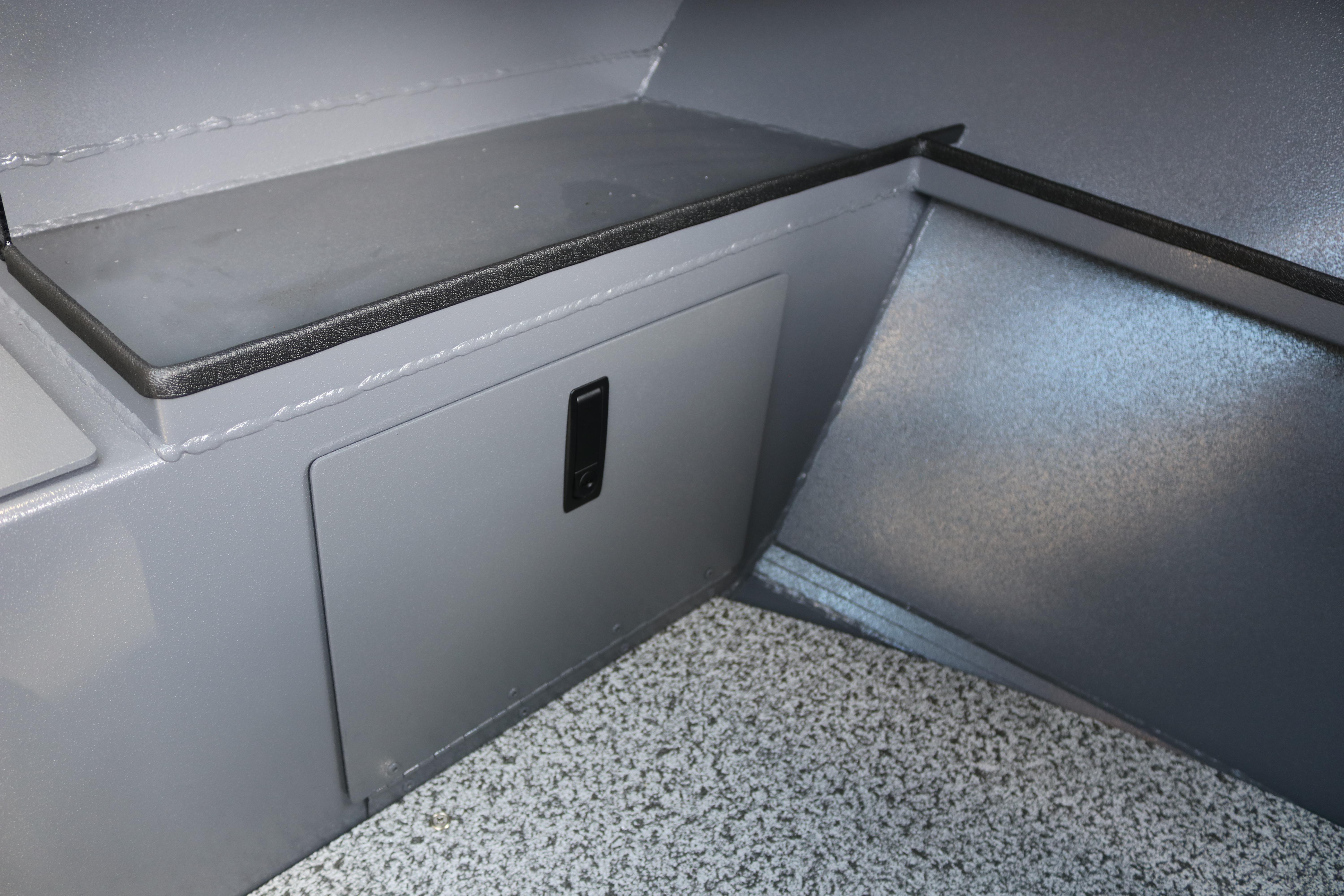 Interior storage compartment of 2026 Alumaweld Stryker X202 boat, featuring sleek design.