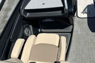 2025 SunCatcher Amara boat interior with beige seating and modern design.