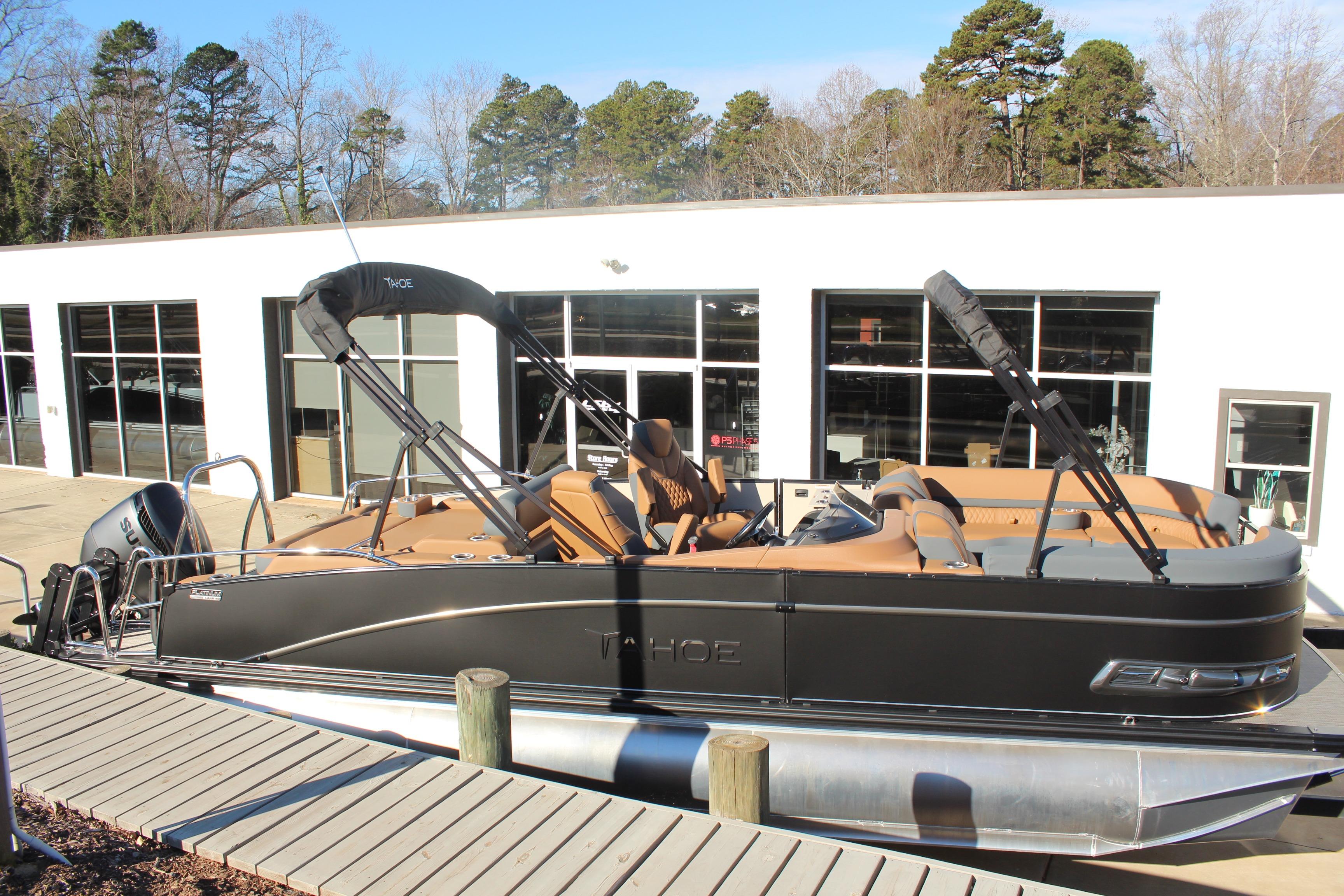 2026 Tahoe Pontoon Cascade Versatile Rear Bench at dock, modern design, outdoor setting.