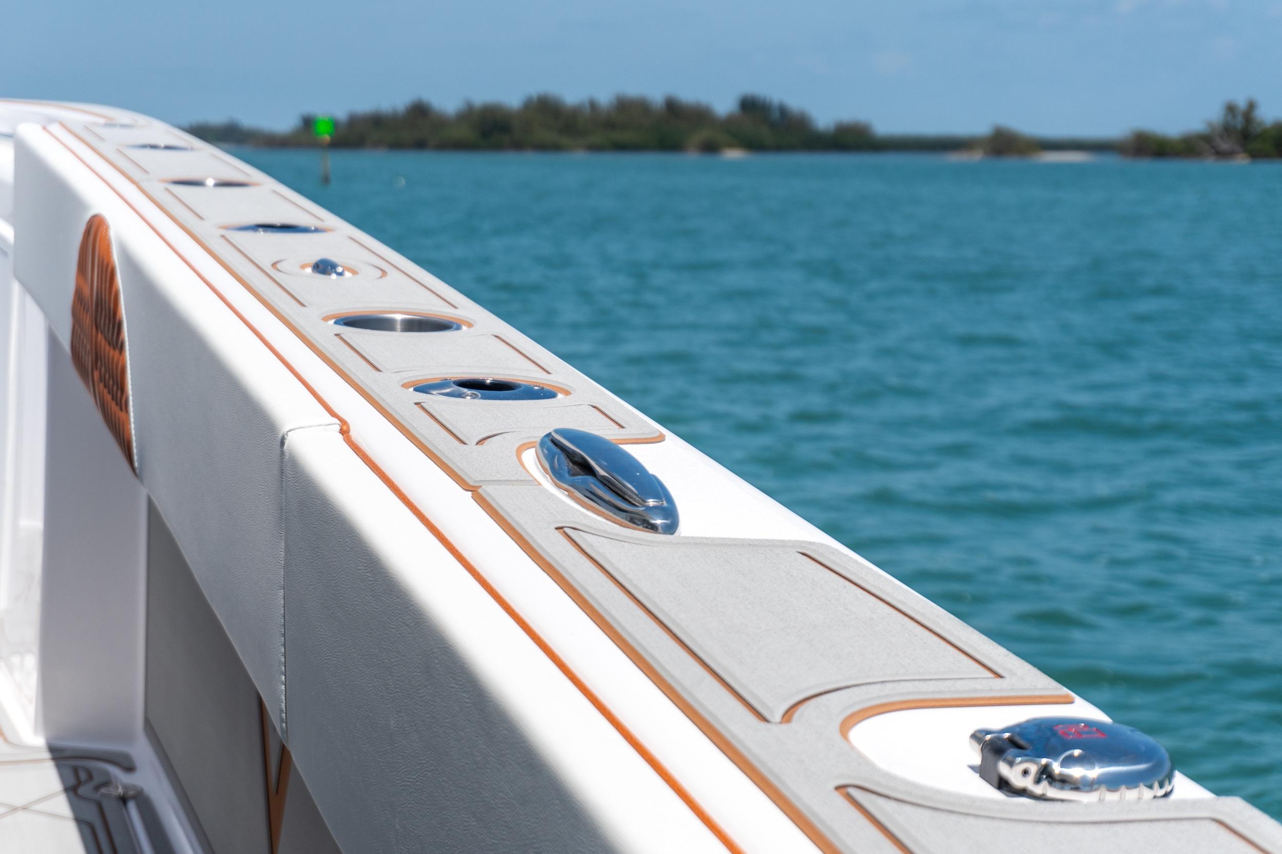 2026 Twin Vee 400 GFX2 CC boat detail with ocean backdrop.