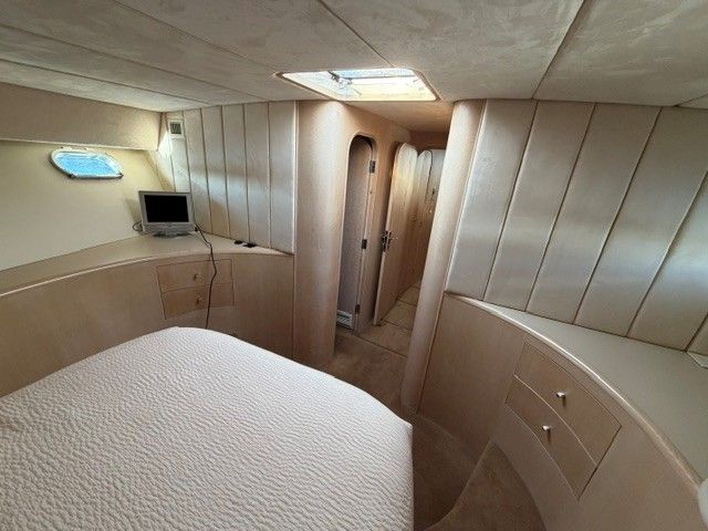 Interior of a 1990 Custom Motor Yacht, bedroom view.