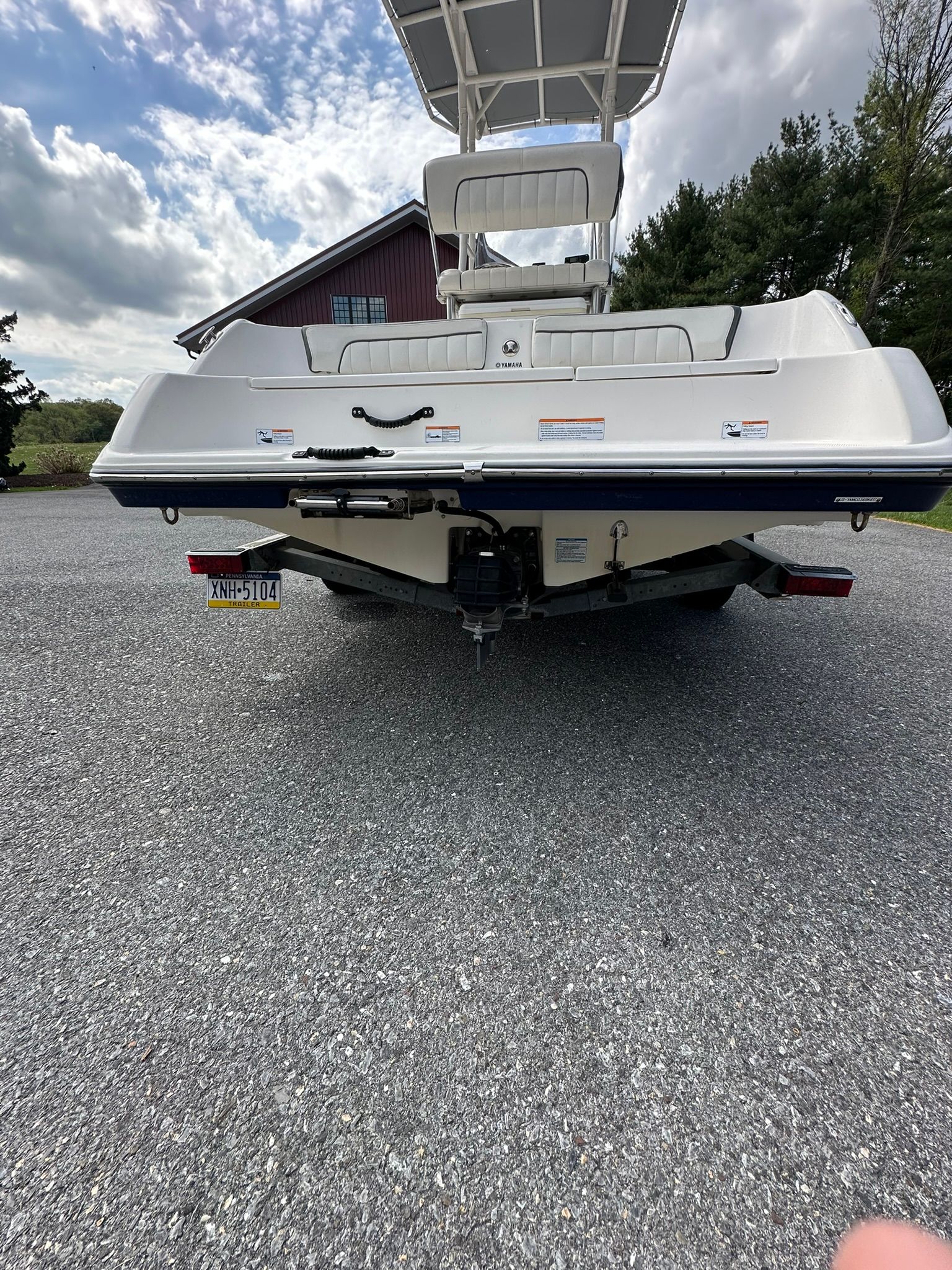 Rear view of 2017 Yamaha Boats 190 FSH Sport on trailer.