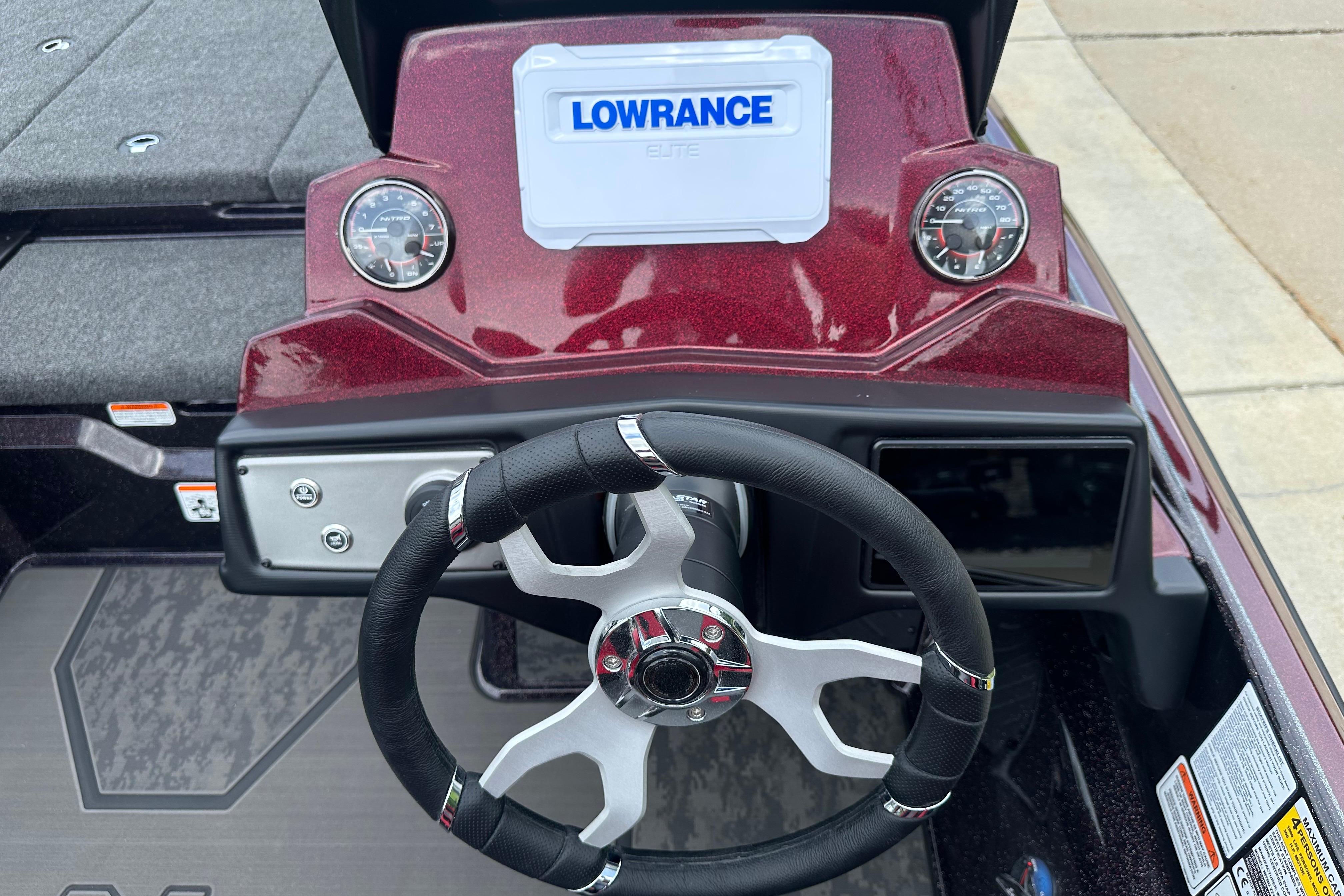 2026 Nitro Z21 XL boat dashboard with Lowrance Elite display and steering wheel.