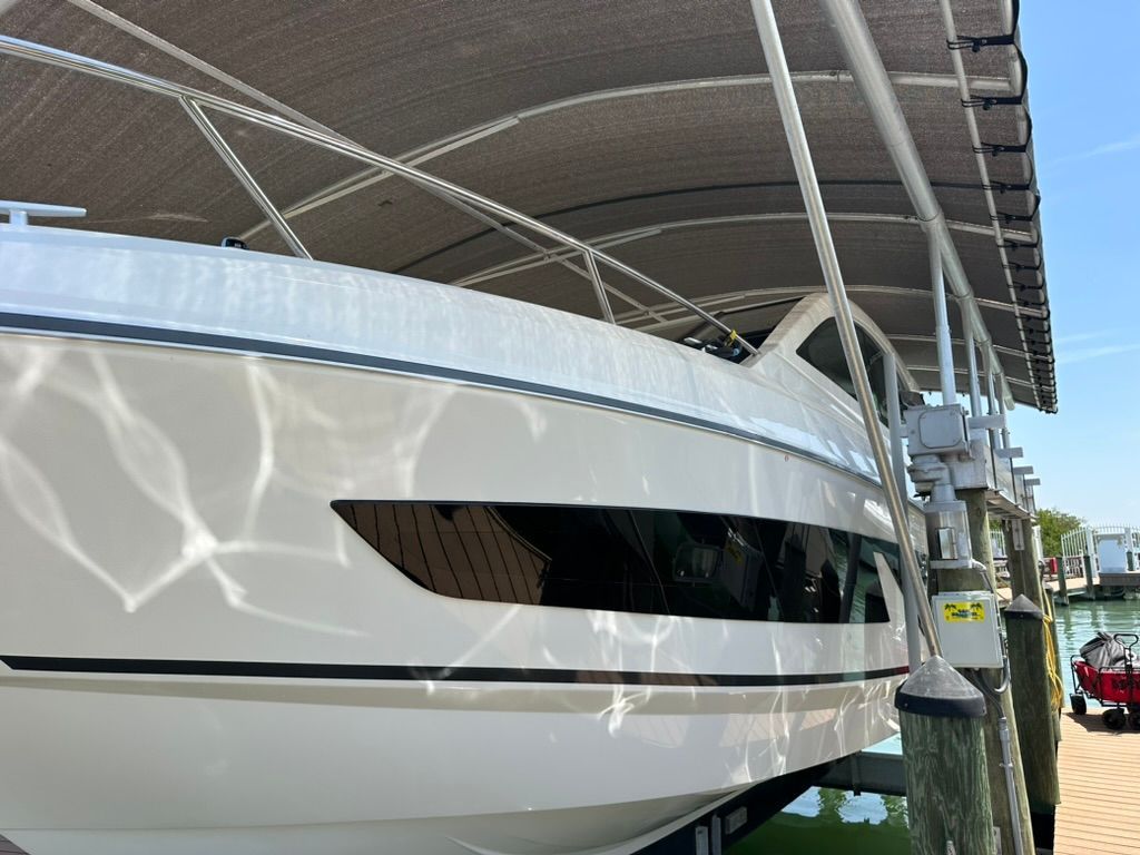 Beneteau Gran Turismo 32, 2024, under a boat canopy.