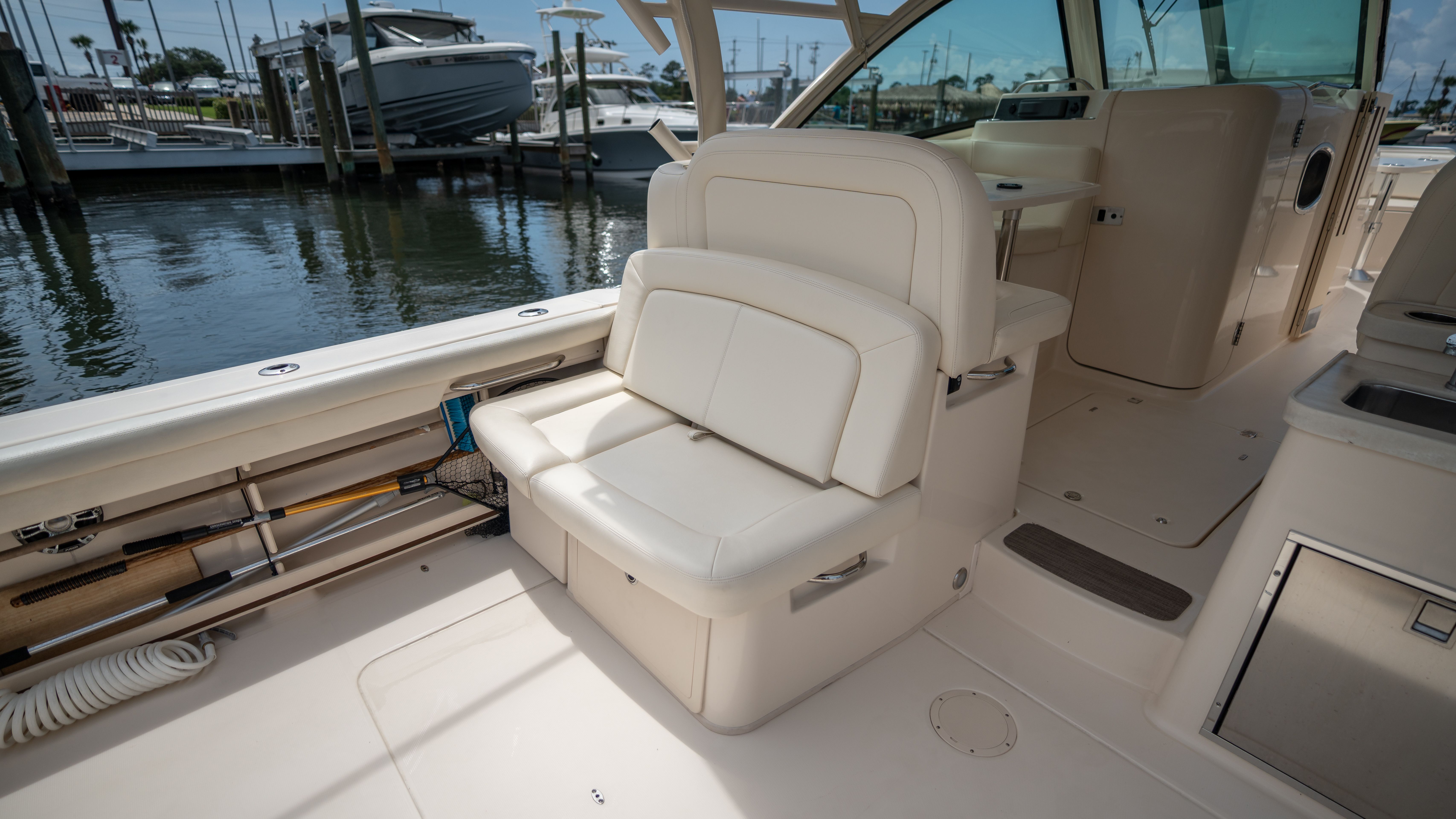 Interior of a 2019 Grady-White 375 Freedom with beige seating area.