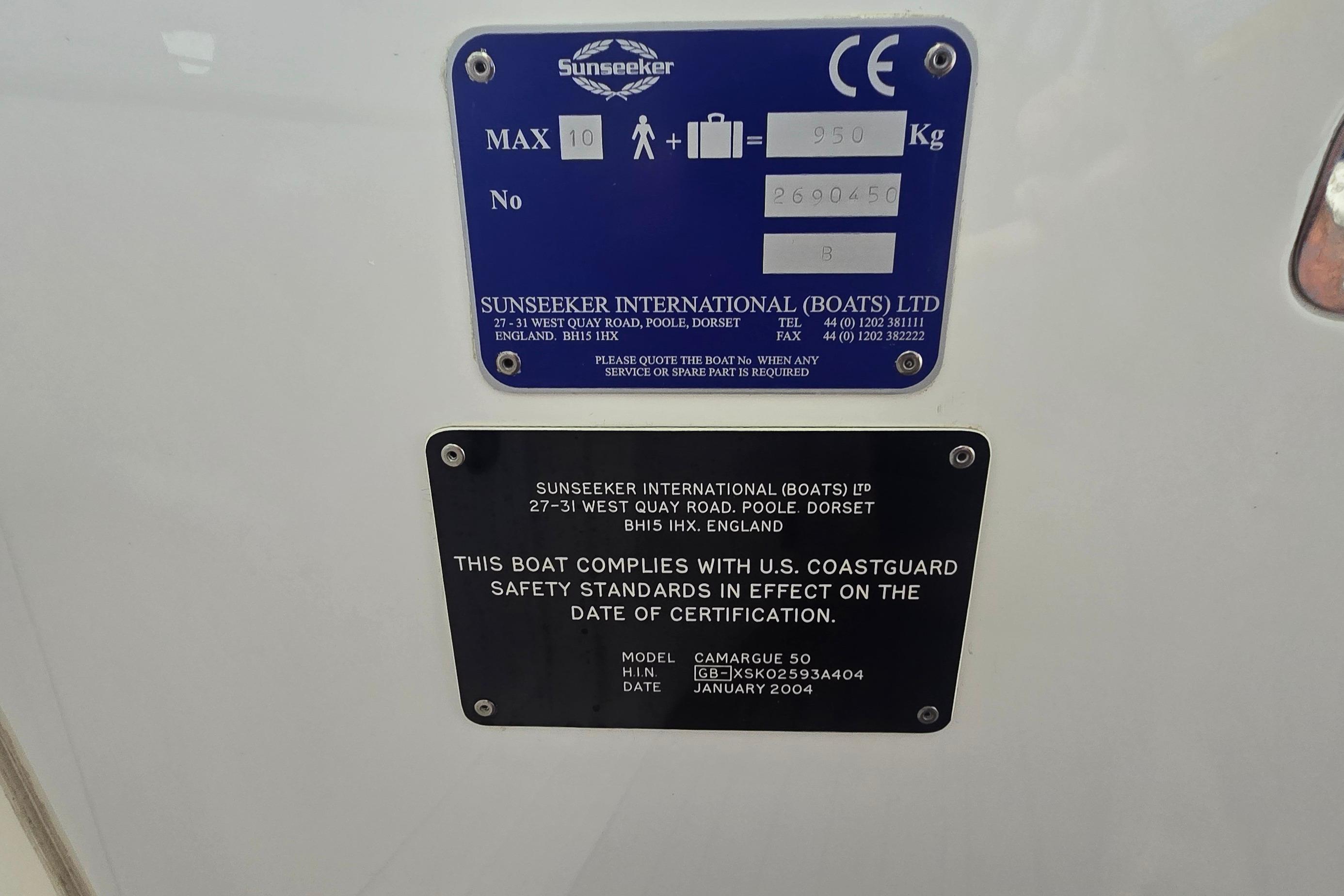 Plaques on a 2004 Sunseeker Camargue 50, displaying safety and certification details.