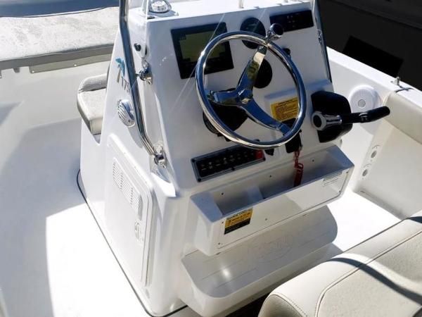 2025 Key West 179 FS boat console with steering wheel and controls.