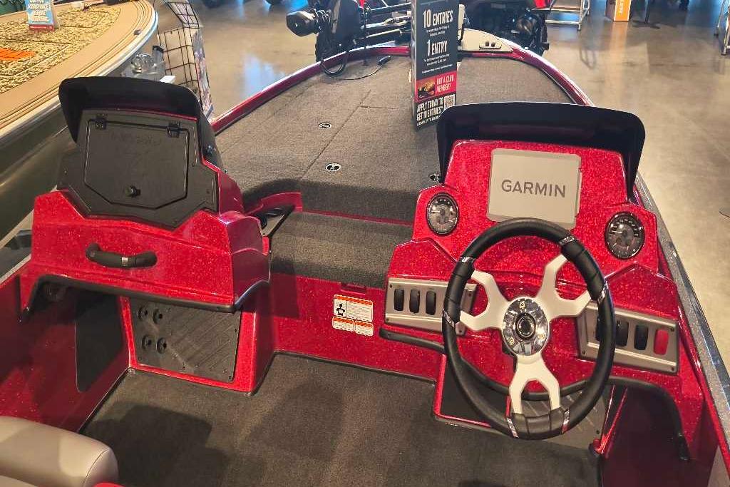 Interior of 2026 Nitro Z18 Pro boat with Garmin navigation system and steering wheel.