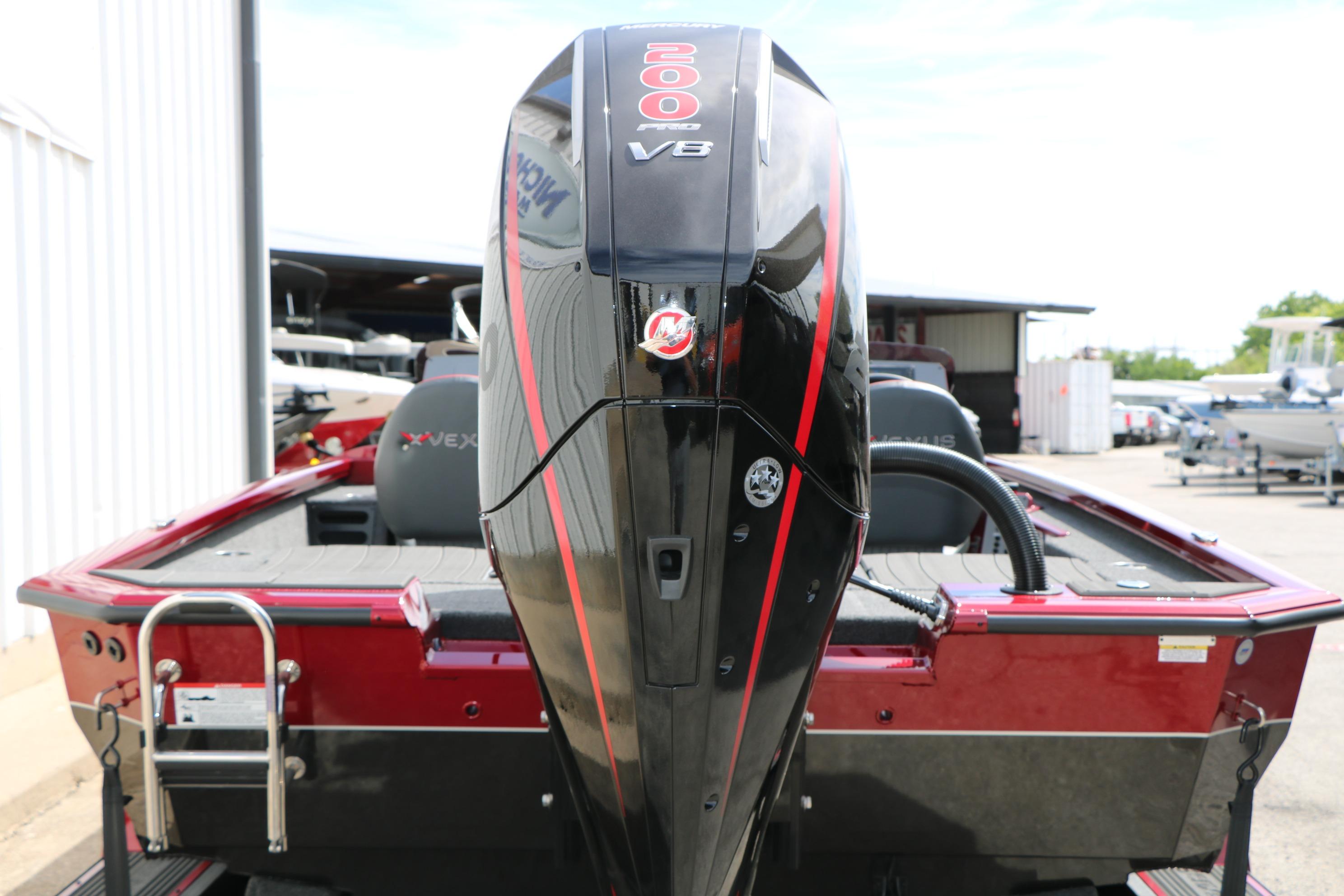 2026 Vexus AVX 1985s boat with powerful 200 HP V8 engine, rear view.