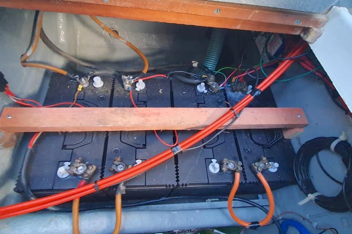 Battery compartment of a 1989 Fairey Spearfish MKIII with wiring and connectors.