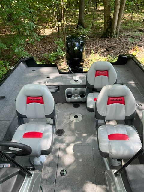 The image shows the interior of a 2016 Tracker Pro Guide V-175 Combo boat with four seats.