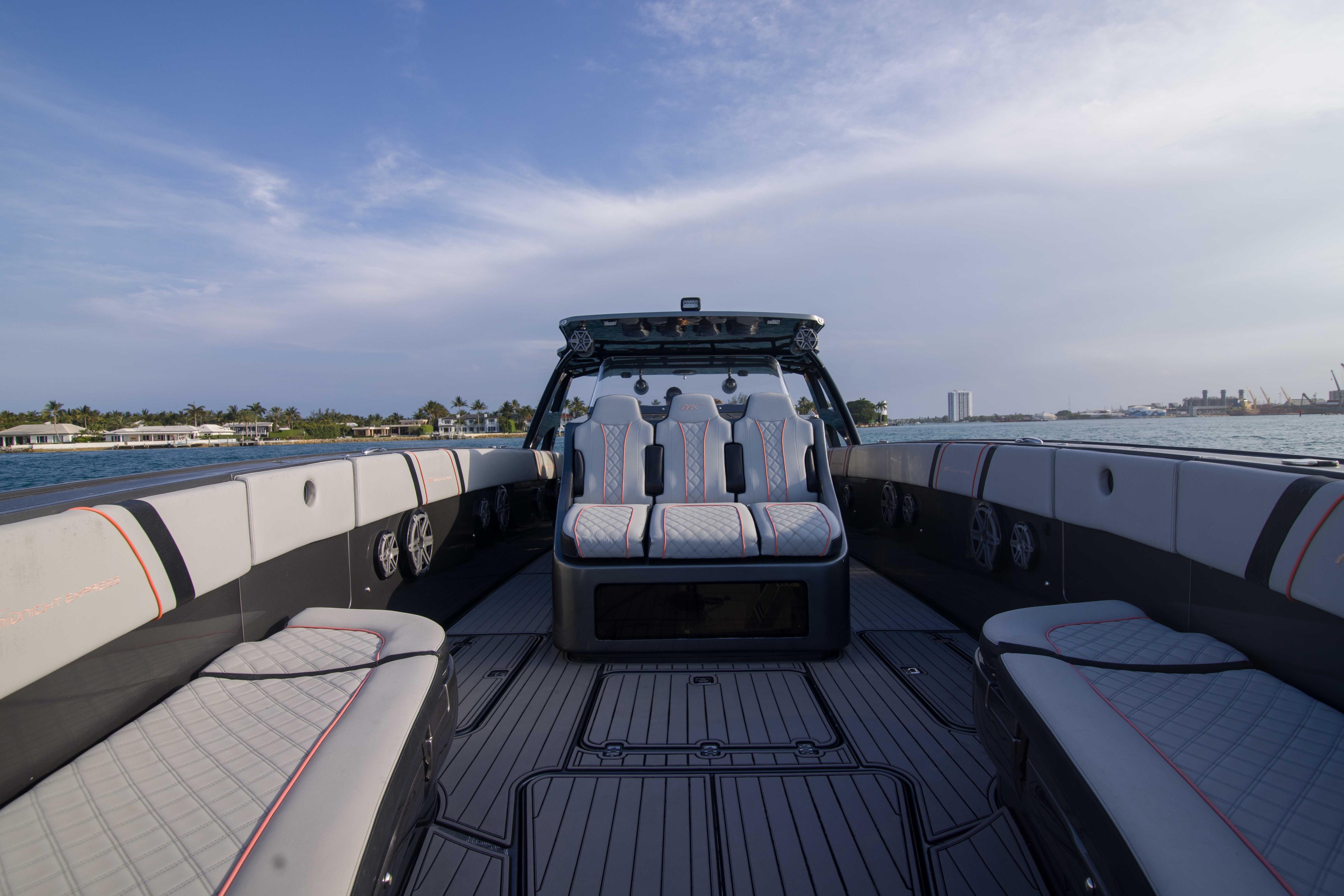 2019 Midnight Express 43 Open boat interior with luxurious seating and scenic water view.