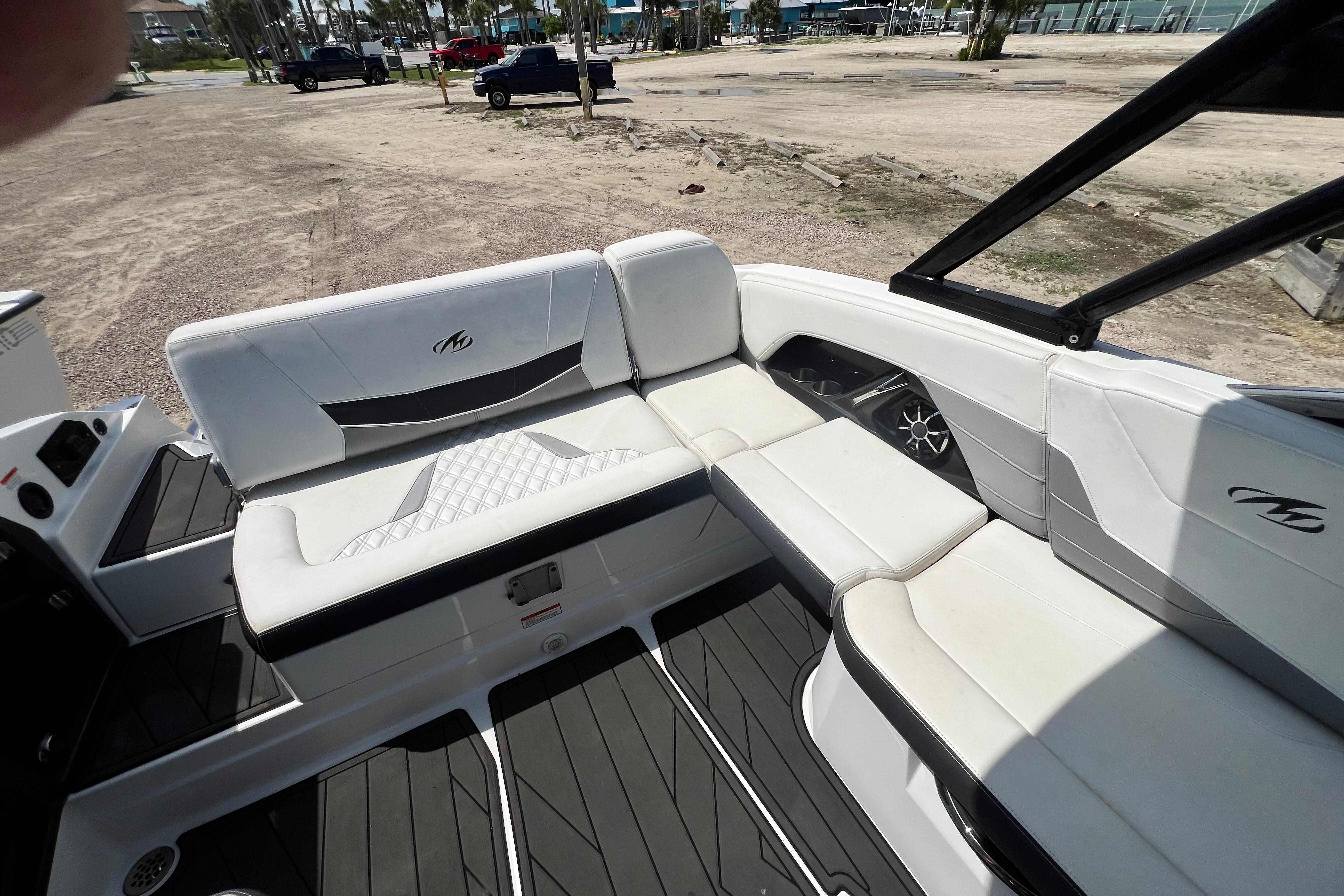 2015 Monterey 268SS Super Sport boat interior with white seating and sleek design.