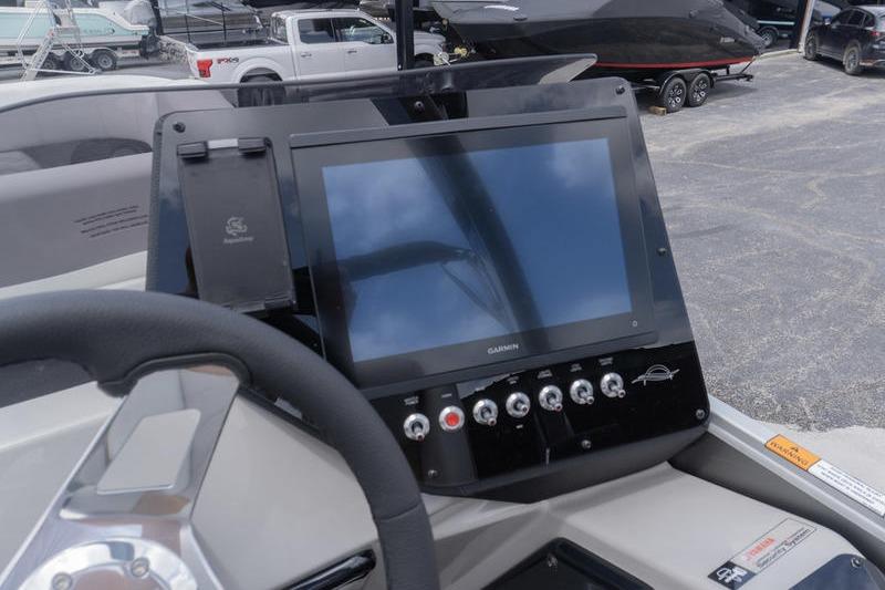 Control panel of 2026 SunCatcher Elite 326 SS boat with Garmin display.