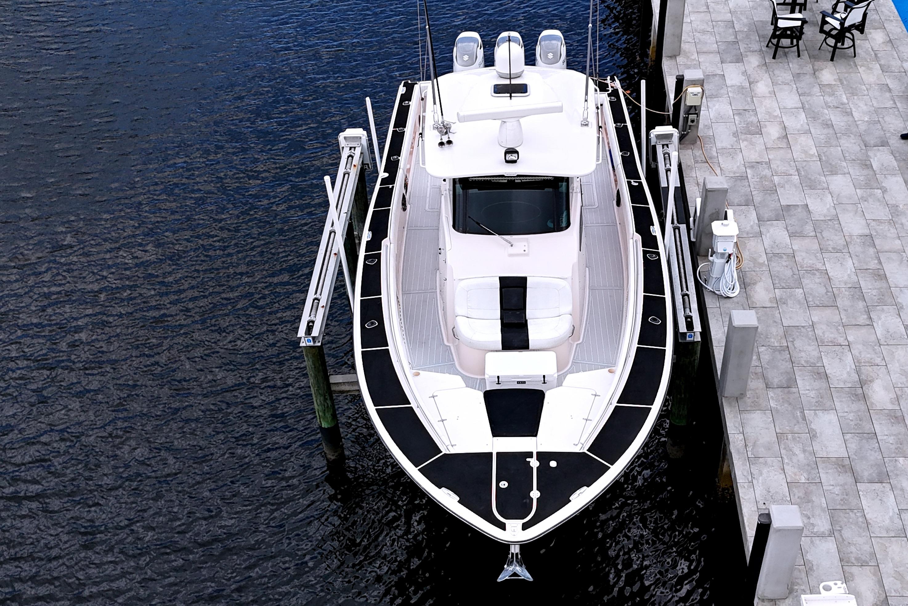 Overhead view of a 2010 Grady-White Canyon 366 boat docked at a marina.