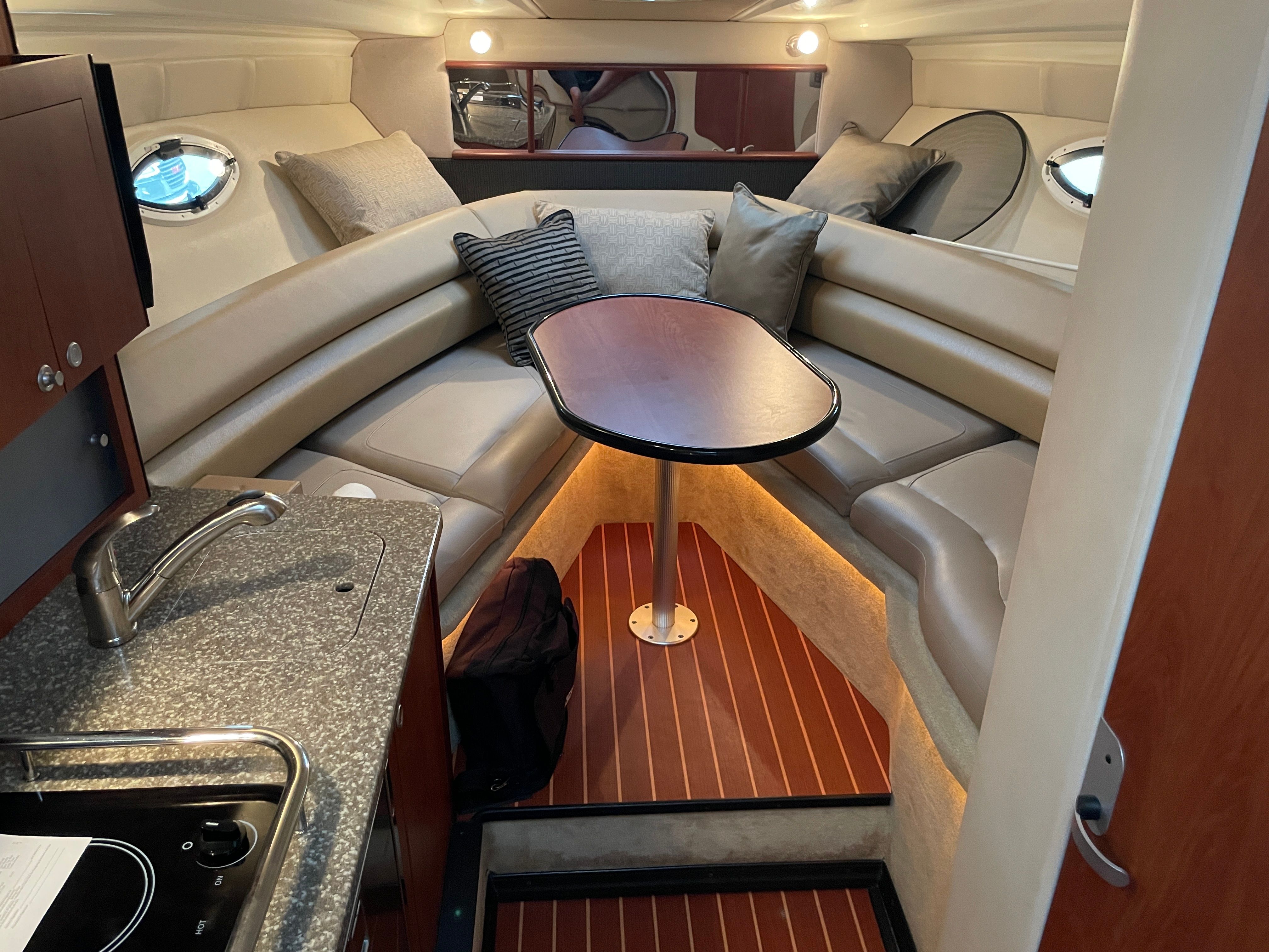Interior of 2010 Monterey 280 Sport Cruiser with kitchenette and seating area.