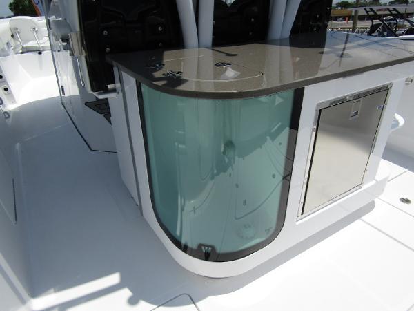 2024 Wellcraft 352 Fisherman boat interior with sleek countertop and storage.