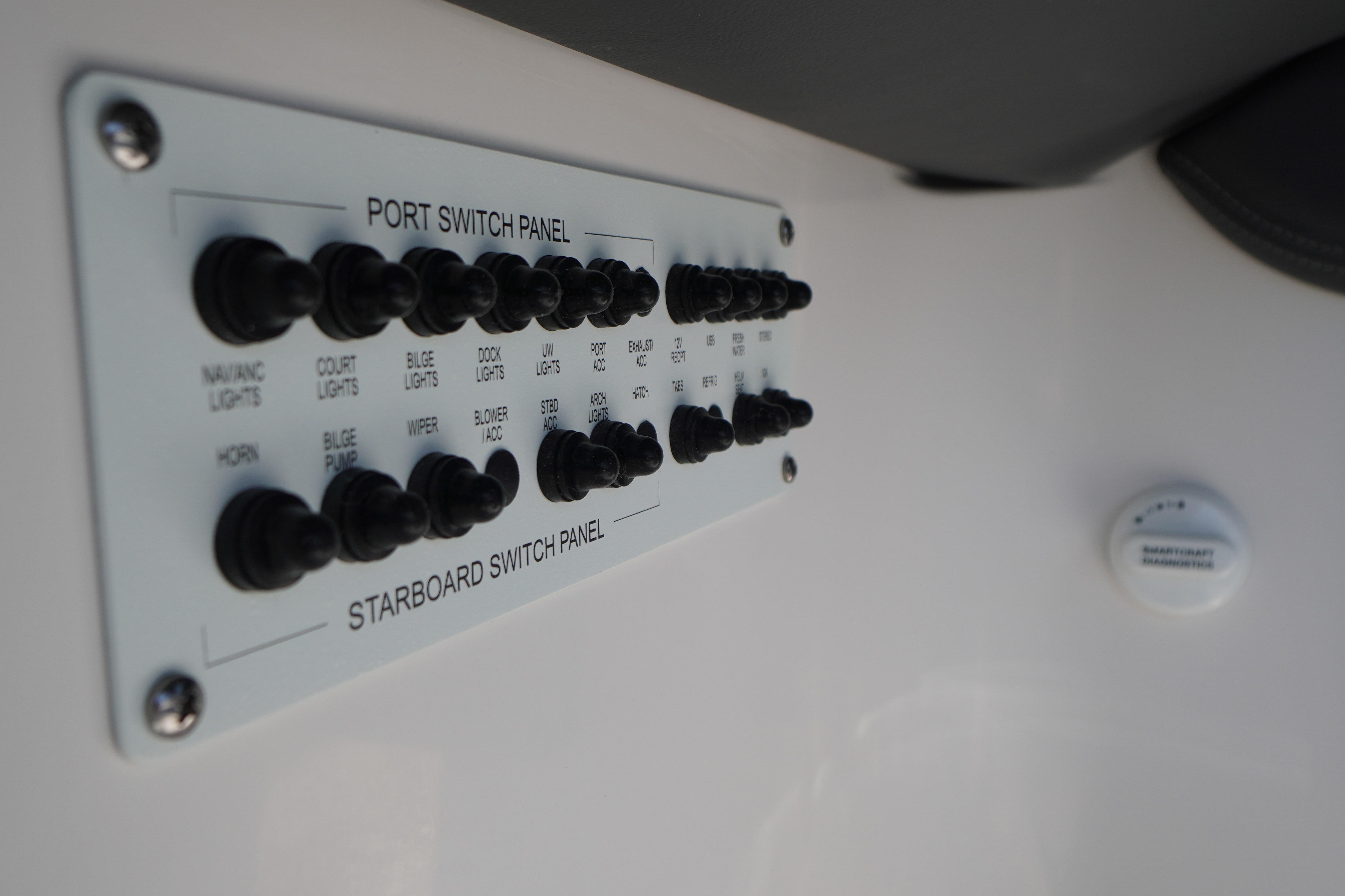 Switch panel on 2026 Chaparral 270 OSX boat, featuring various control toggles.