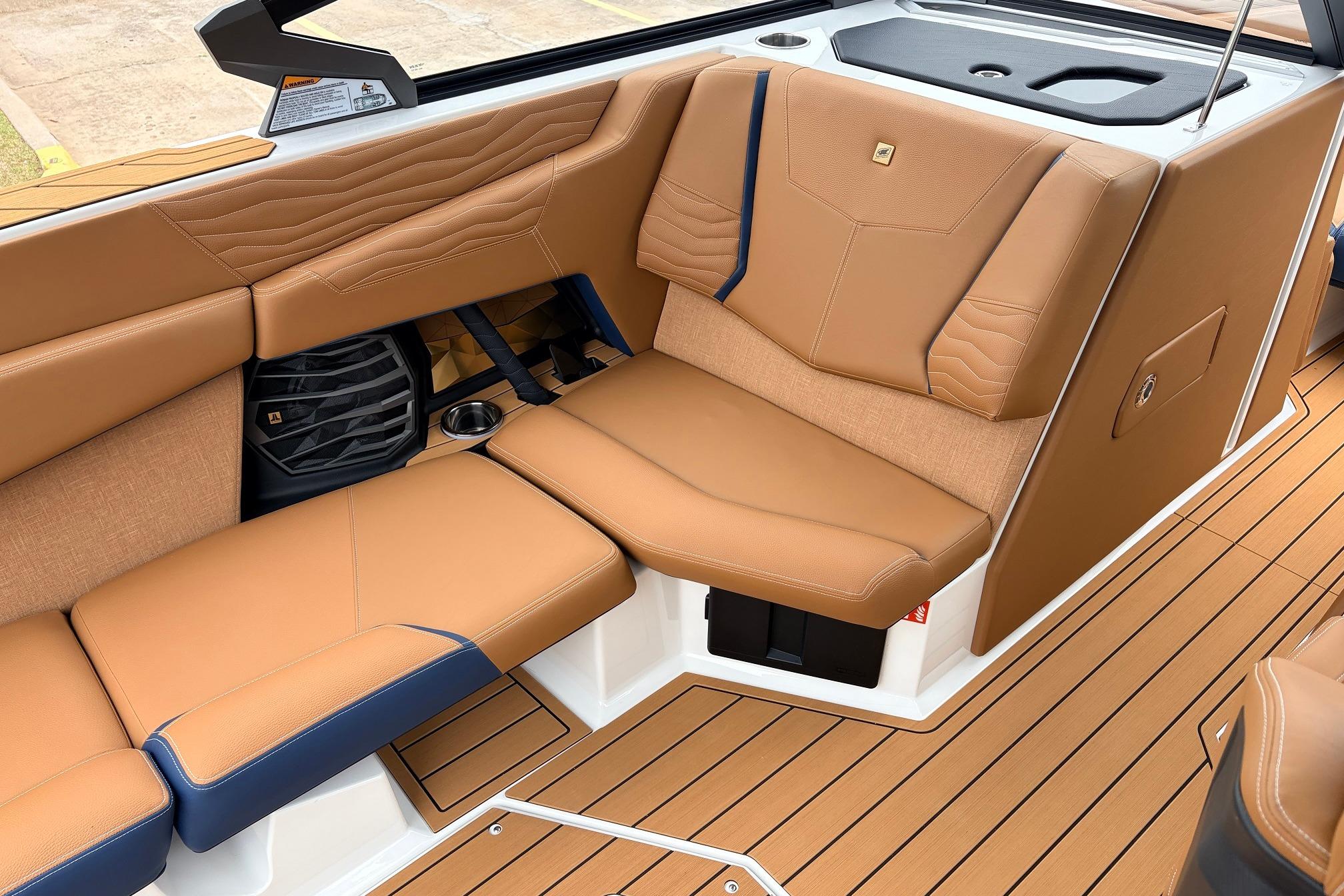 2026 Nautique Super Air Nautique G25 interior with tan leather seating and sleek design.