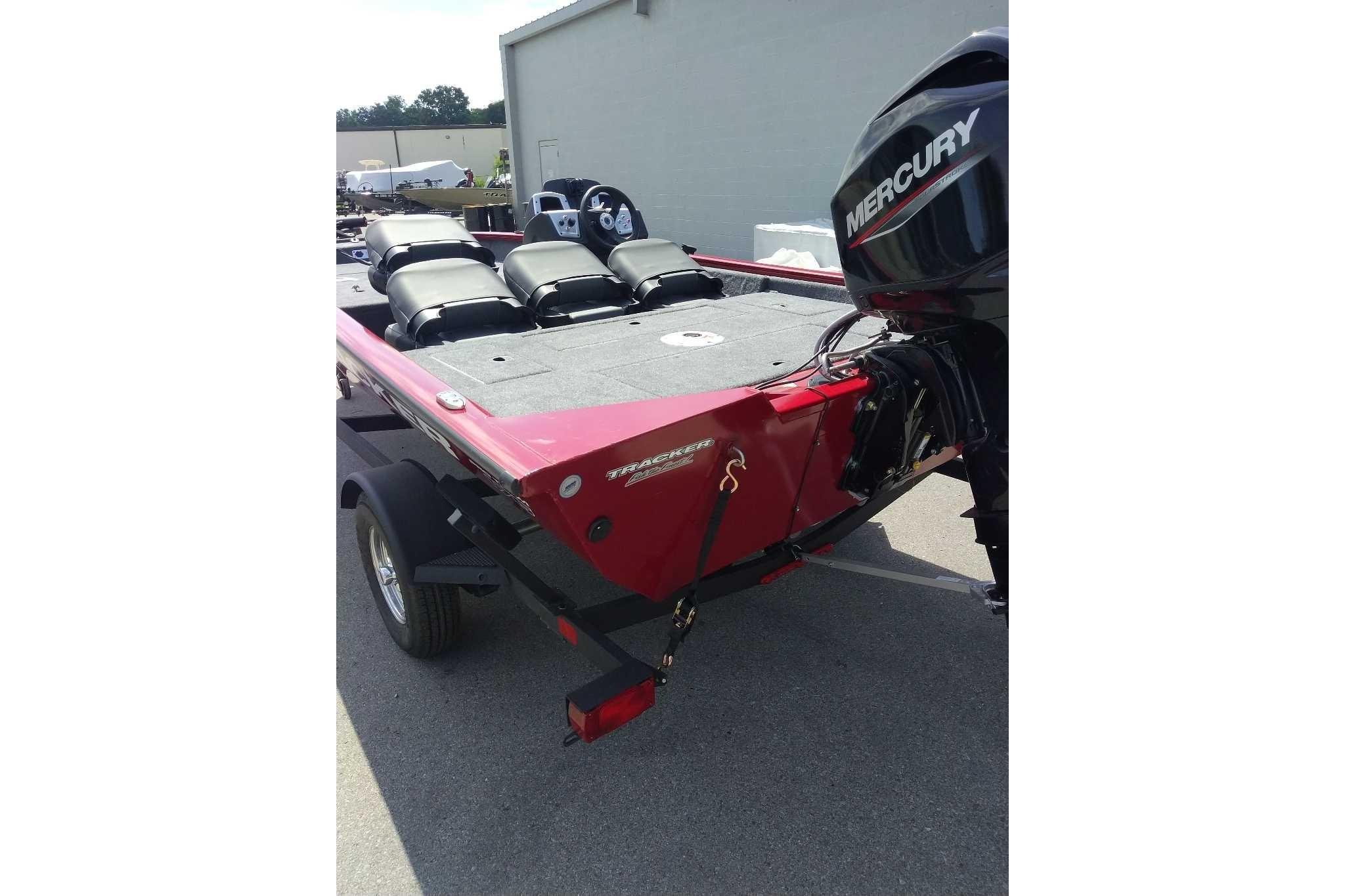 2026 Tracker Pro Team 175 Crappie Edition boat with Mercury engine, parked outdoors.