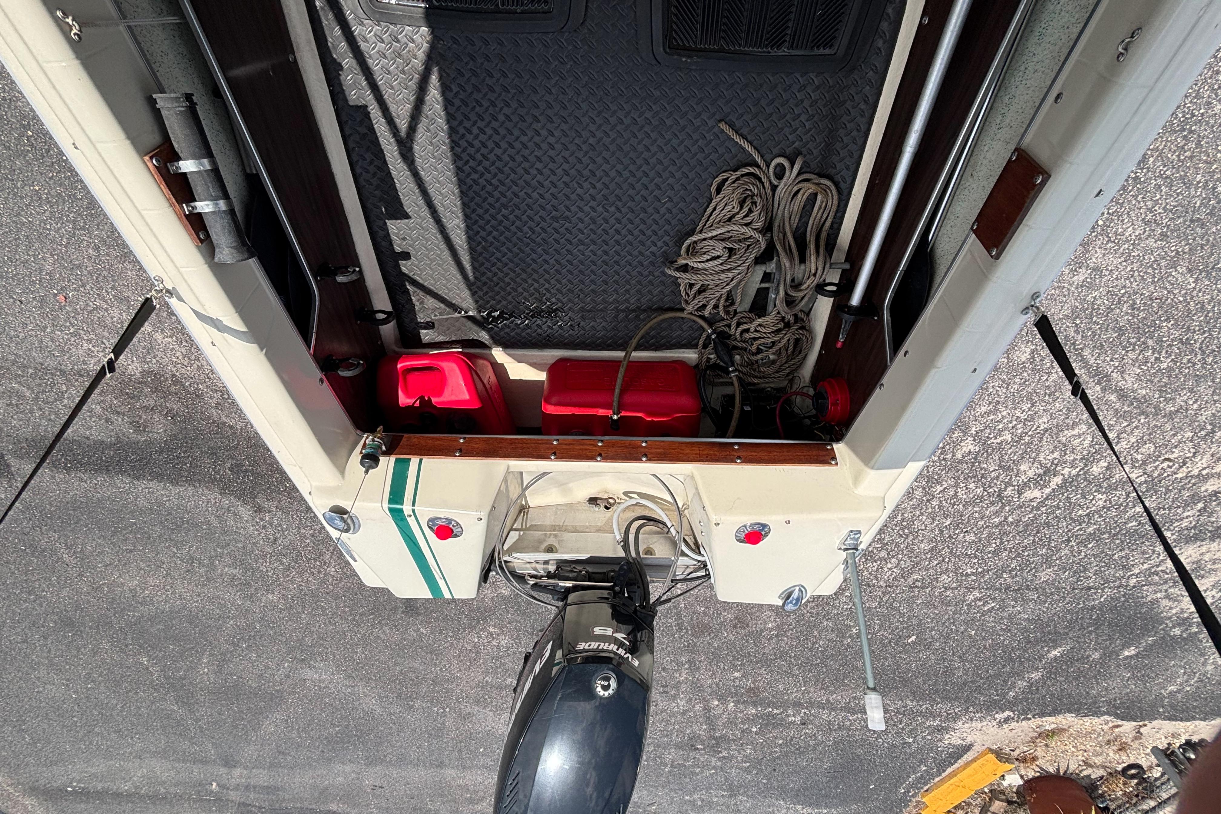 Overhead view of a 1966 Mohawk 15 boat interior with ropes and equipment.