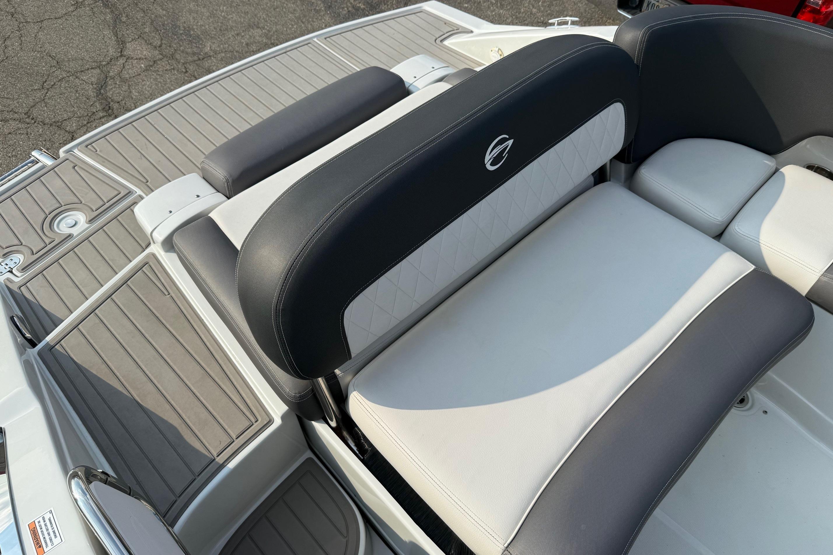 2023 Crownline 260 SS boat seating with gray and white upholstery, featuring a sleek design.
