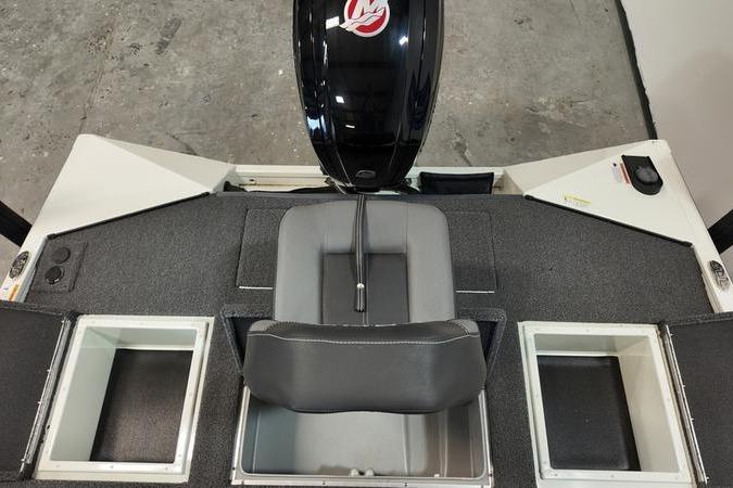 2024 Lowe Stinger 188 boat interior with seating and storage compartments.