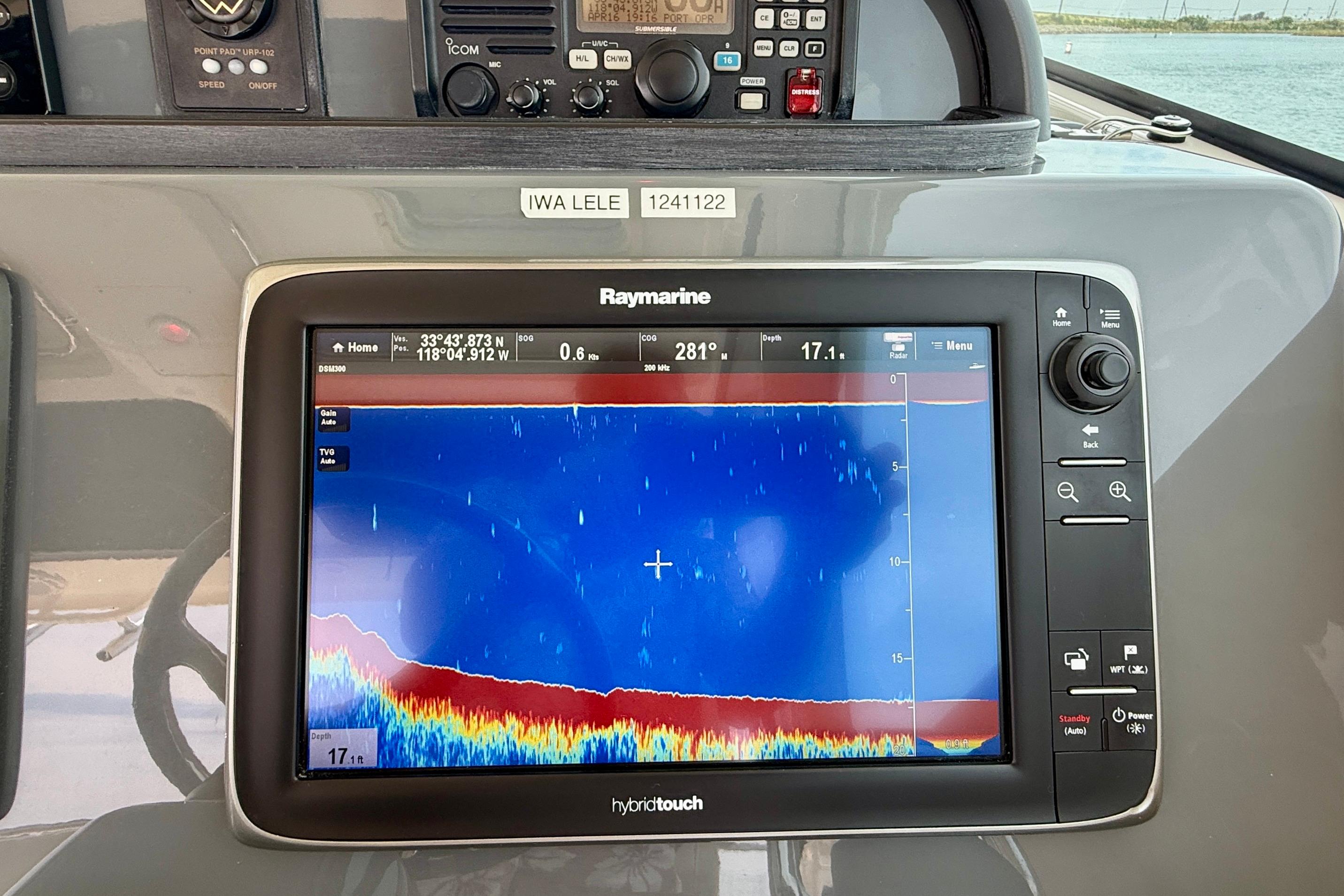 Raymarine navigation display on 2012 Pursuit OS 345 Offshore boat, showing depth and coordinates.