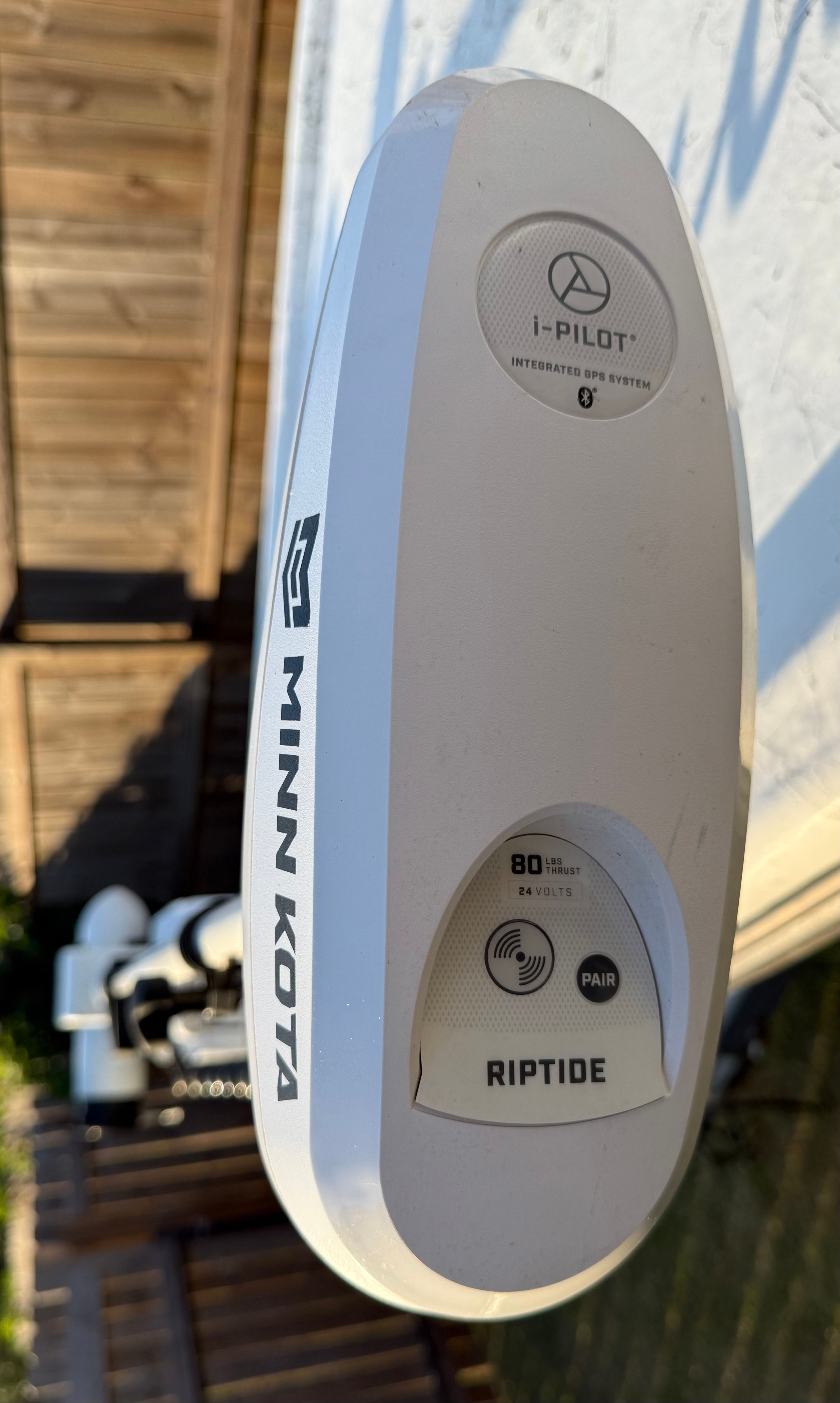 Close-up of a Minn Kota Riptide i-Pilot motor on a boat.