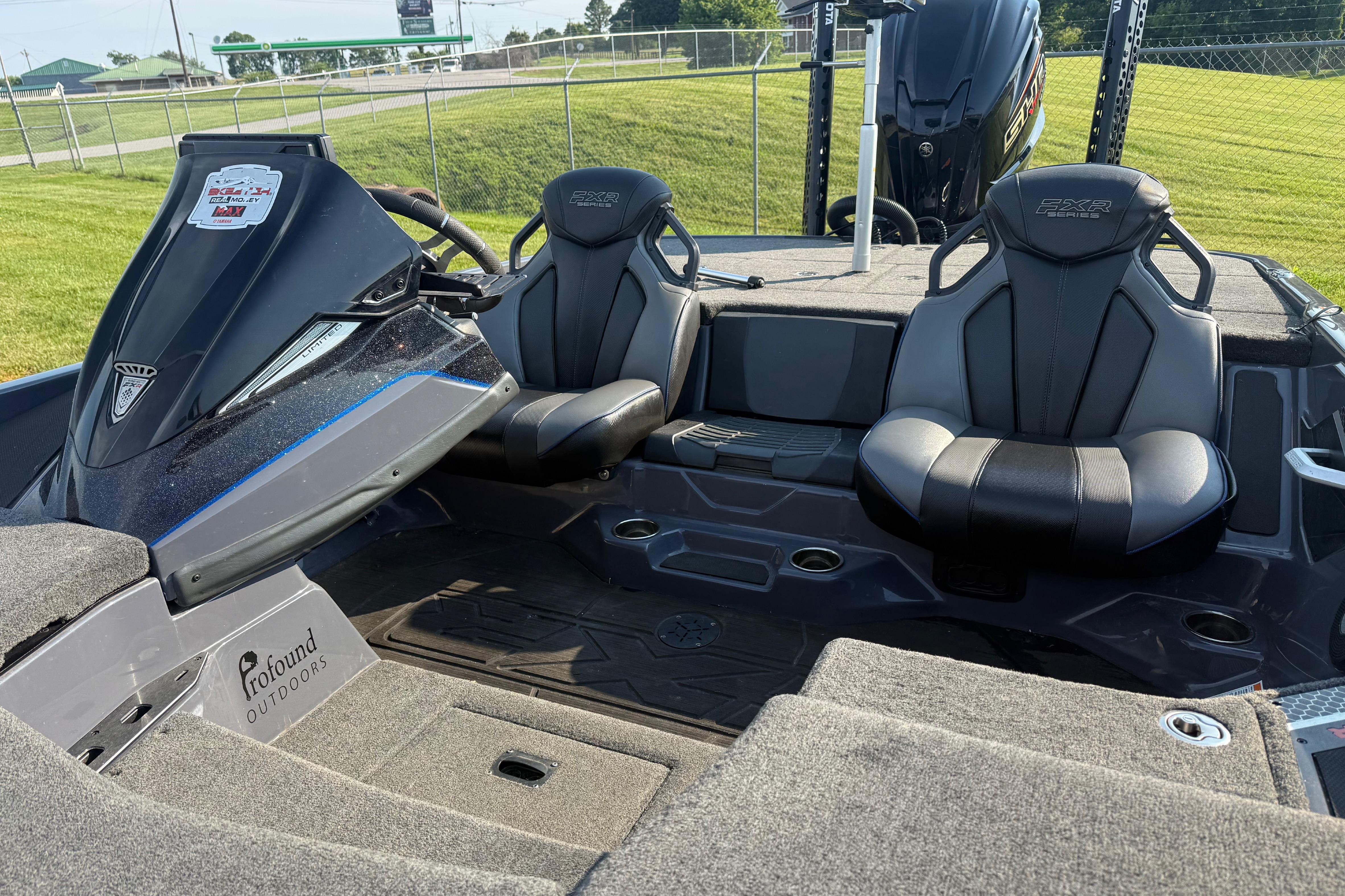 2024 Skeeter FXR21 boat interior with dual seats and steering console.