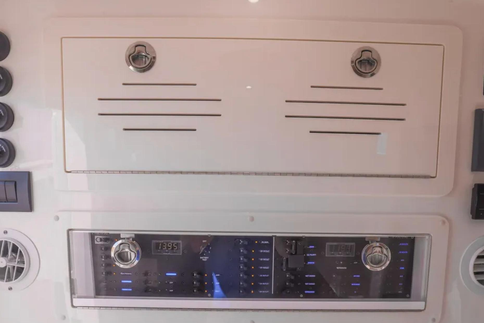 Control panel of 2025 Blackwater 41 Performance Fish boat with switches and dials.