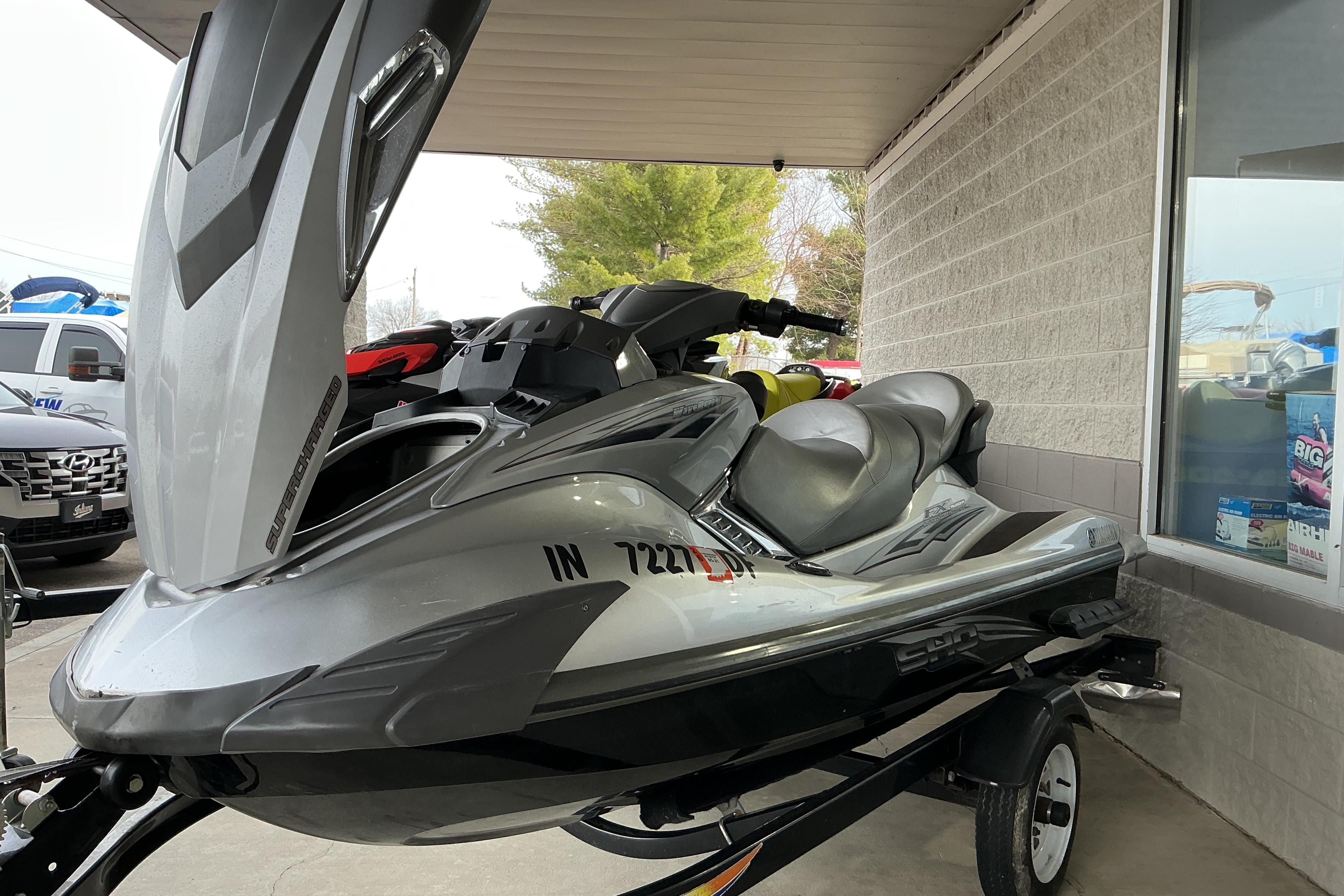2008 Yamaha WaveRunner FX Cruiser SHO in showroom, sleek design, parked on trailer.