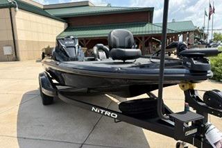 2026 Nitro Z18 boat on trailer, parked outdoors near a building.
