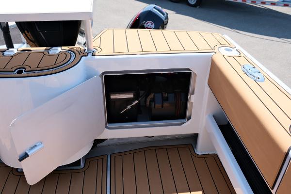 Makaira Gen3 800 boat interior, open storage compartment, teak flooring, 2023 model.