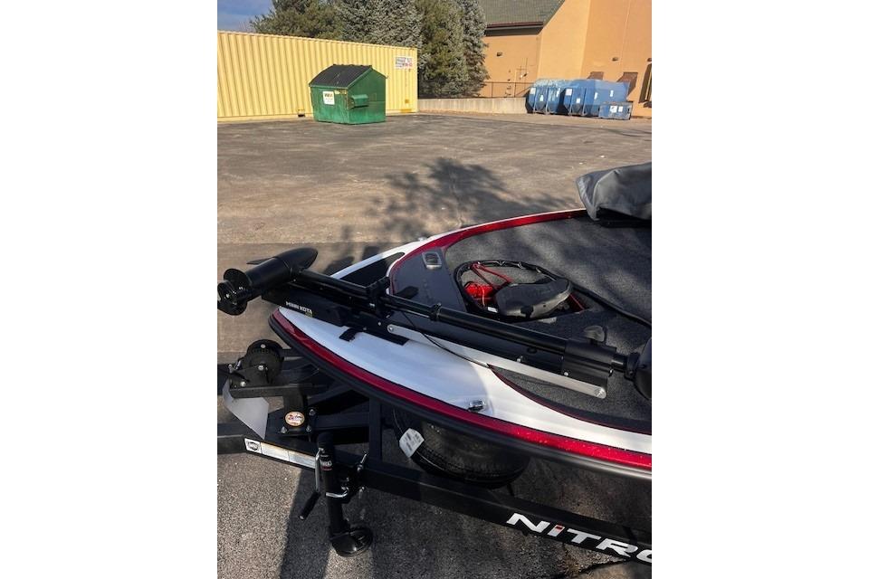 2026 Nitro Z17 boat with mounted equipment in a parking area.