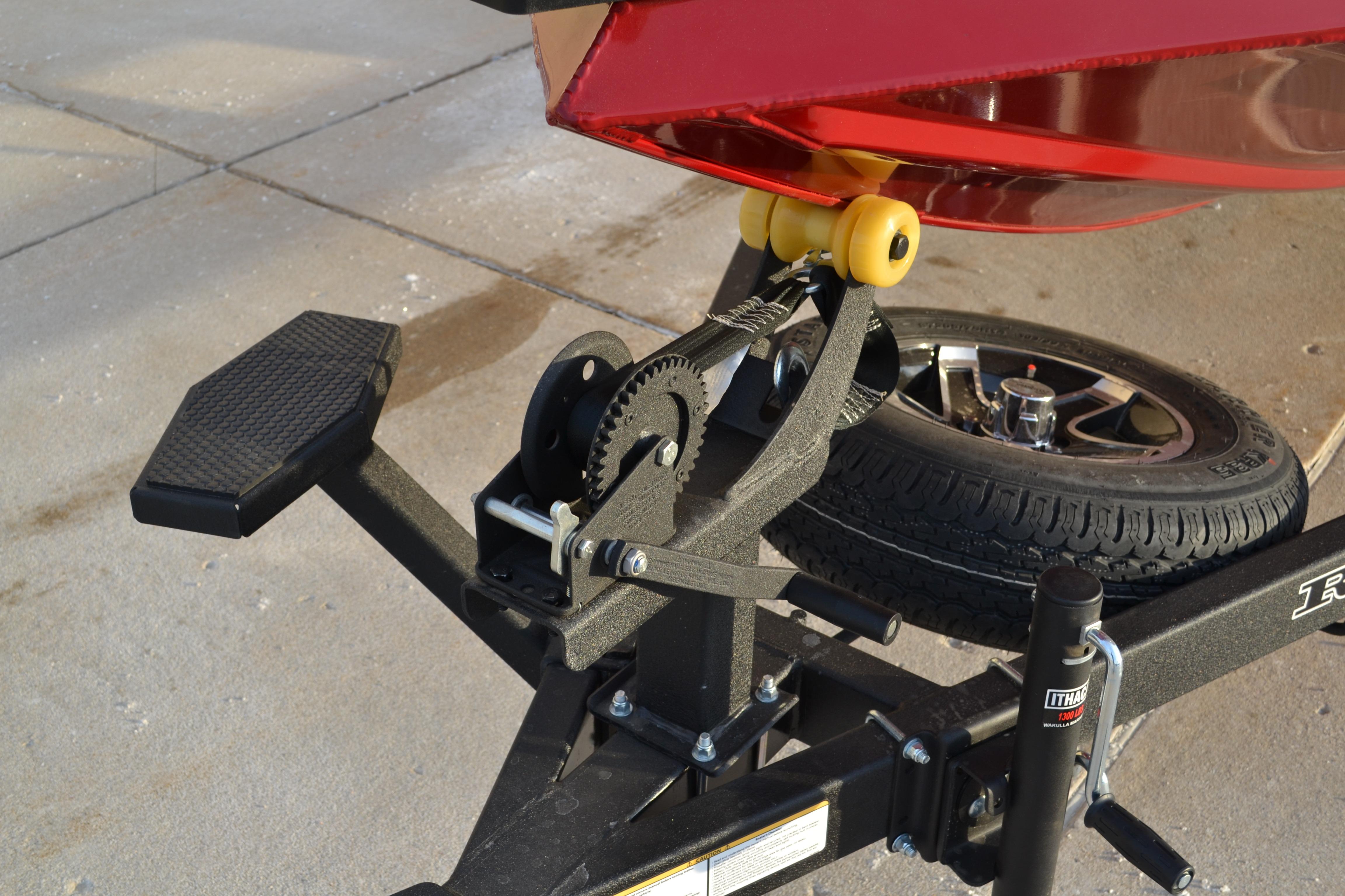 2026 Ranger RT188 boat trailer with winch and spare tire on concrete surface.
