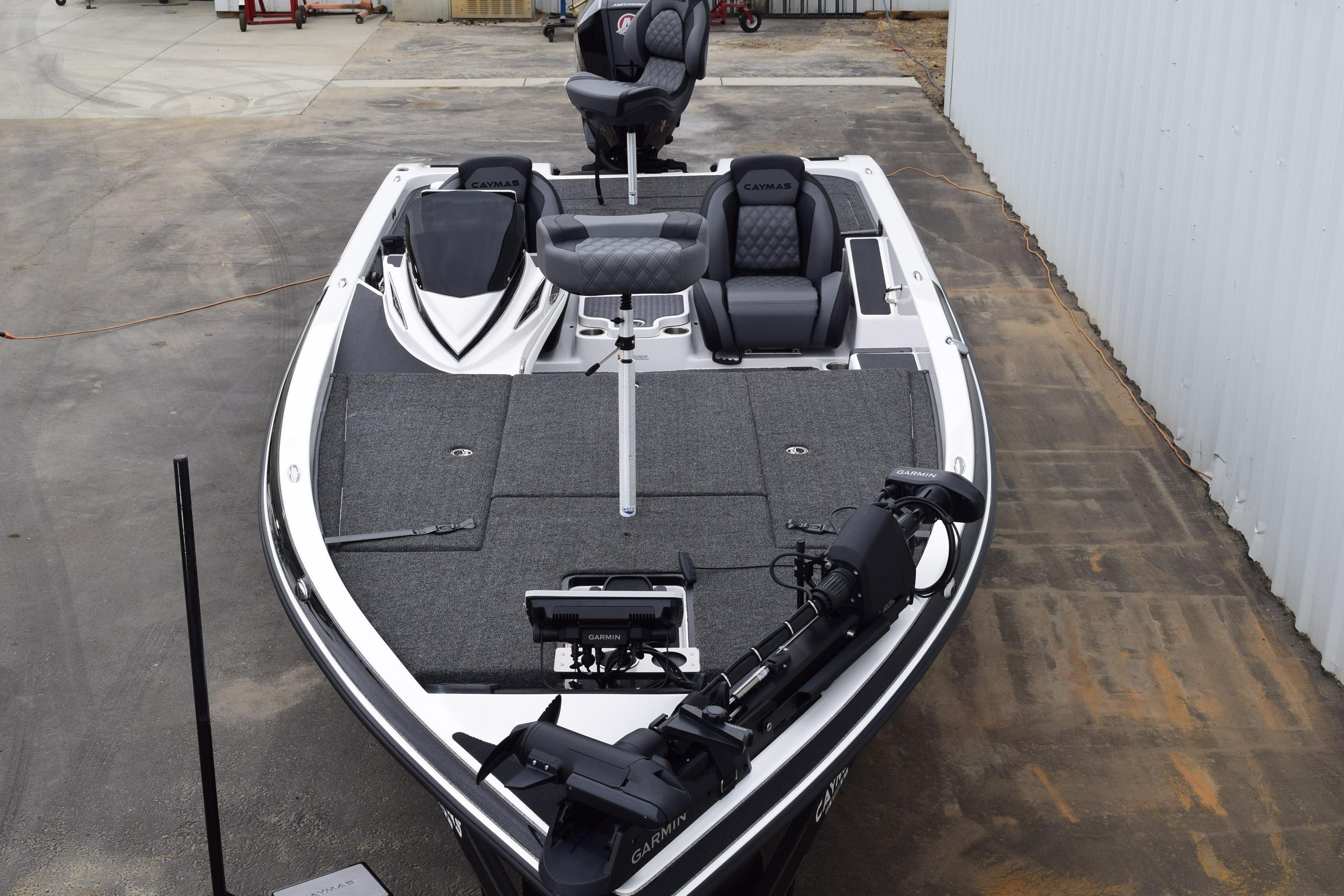 2027 Cayams CX 20 PRo fishing boat with advanced seating and equipment on display.
