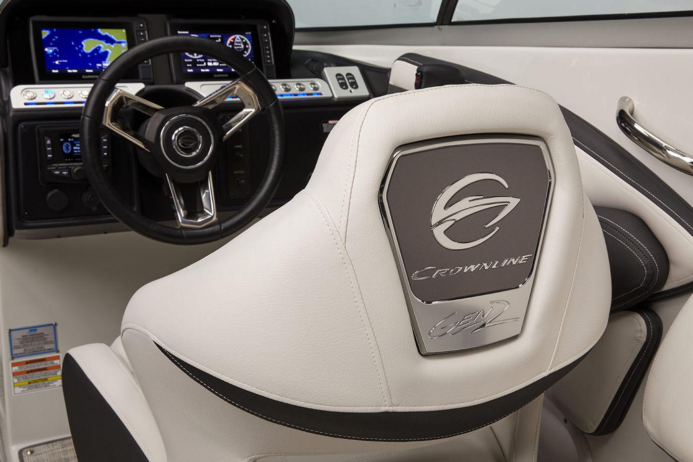 Manufacturer Provided Image: 2025 Crownline 278 SS boat interior with steering wheel and branded seat.