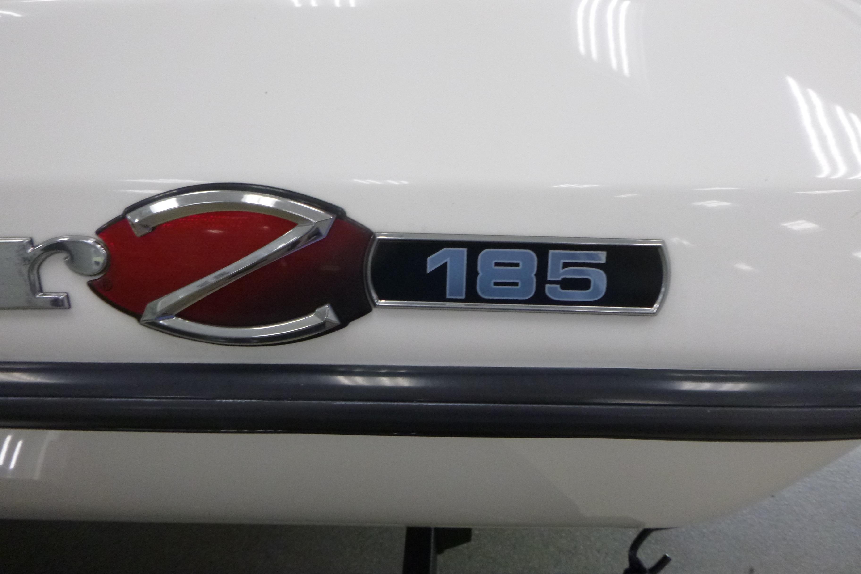 2025 Ranger Z185 emblem on a white surface, featuring bold red and blue accents.